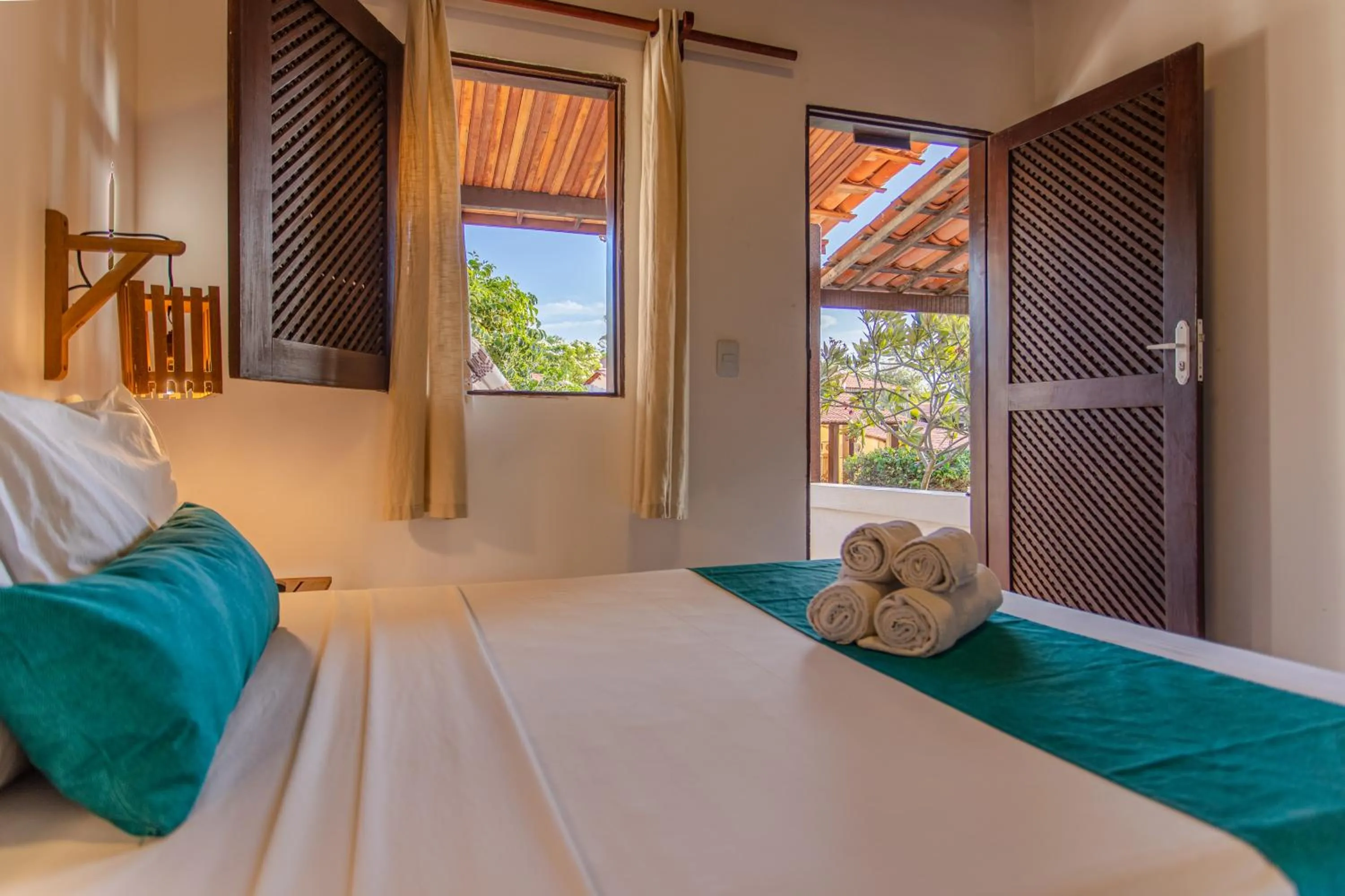 Bed in Pousada Capitão Thomaz