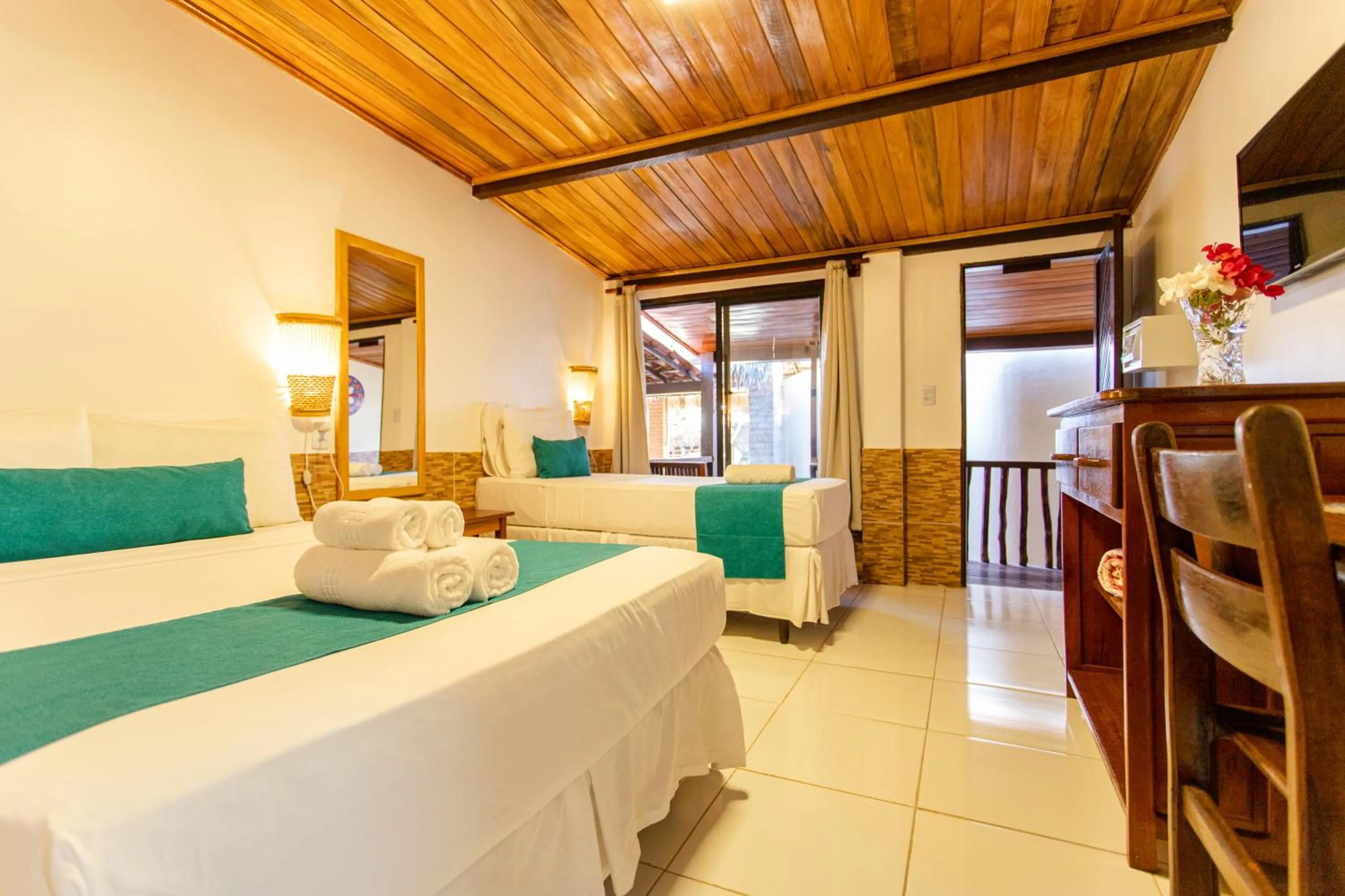 Bed in Pousada Capitão Thomaz