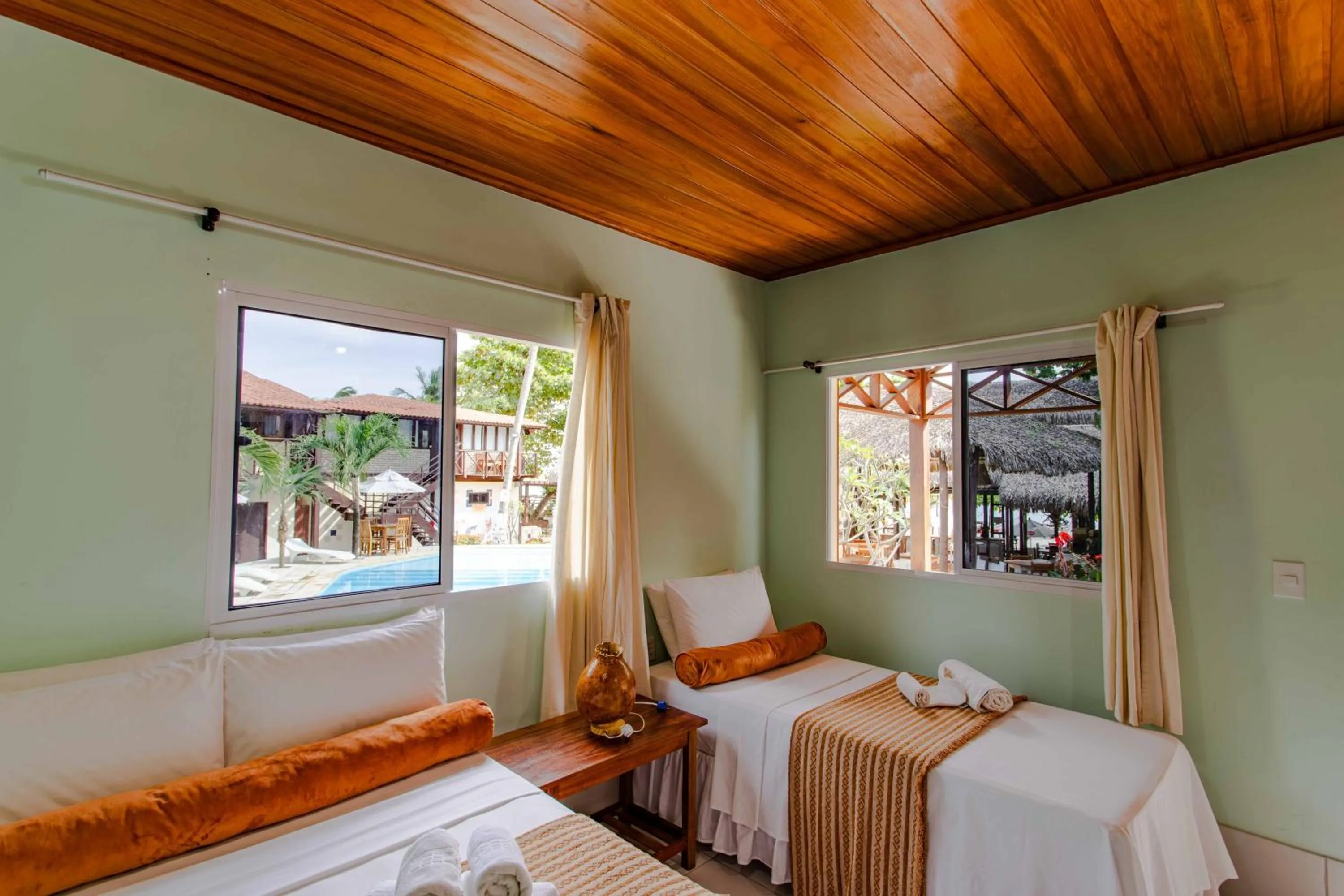 Bed in Pousada Capitão Thomaz