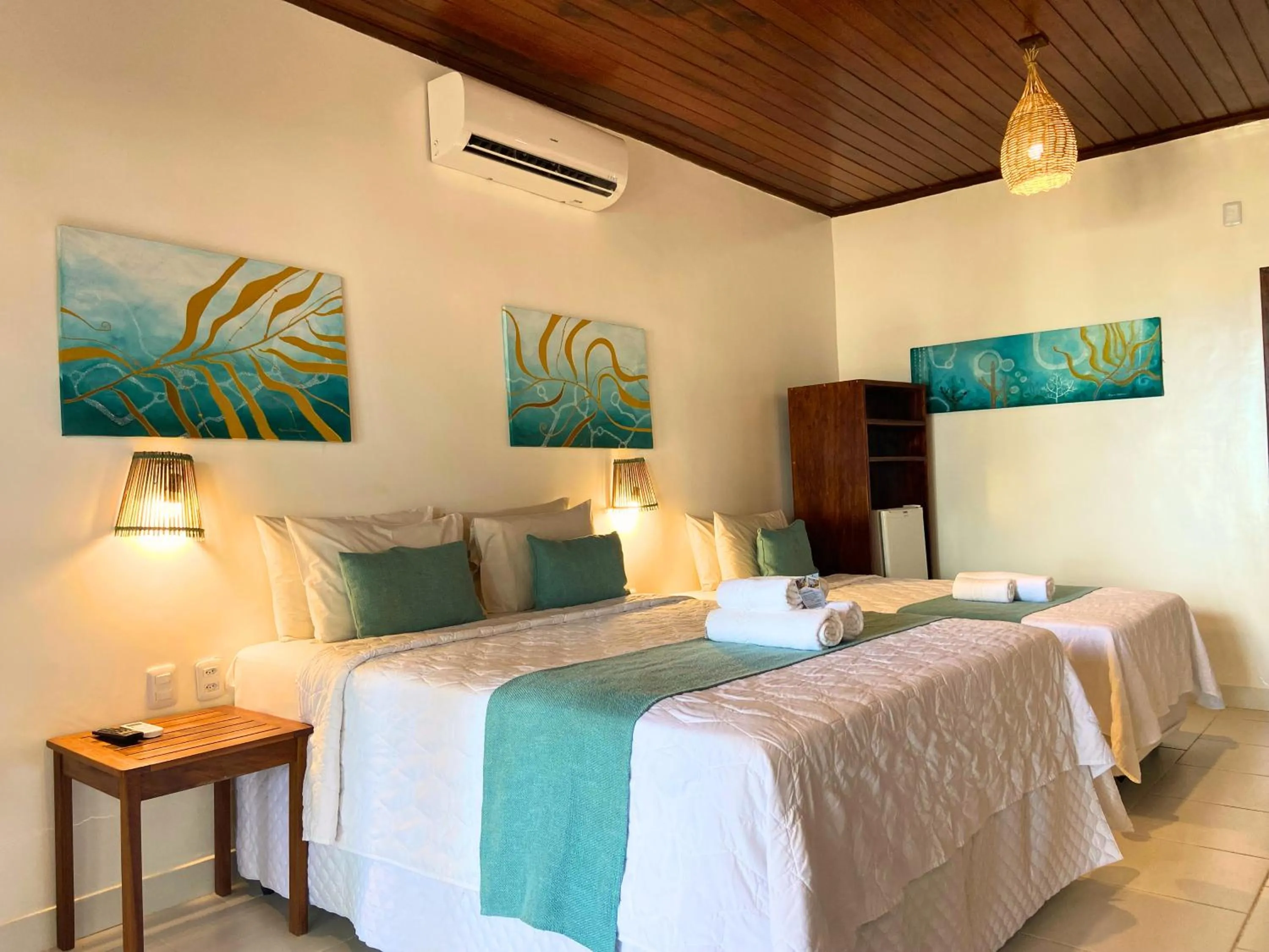 Bed in Pousada Capitão Thomaz