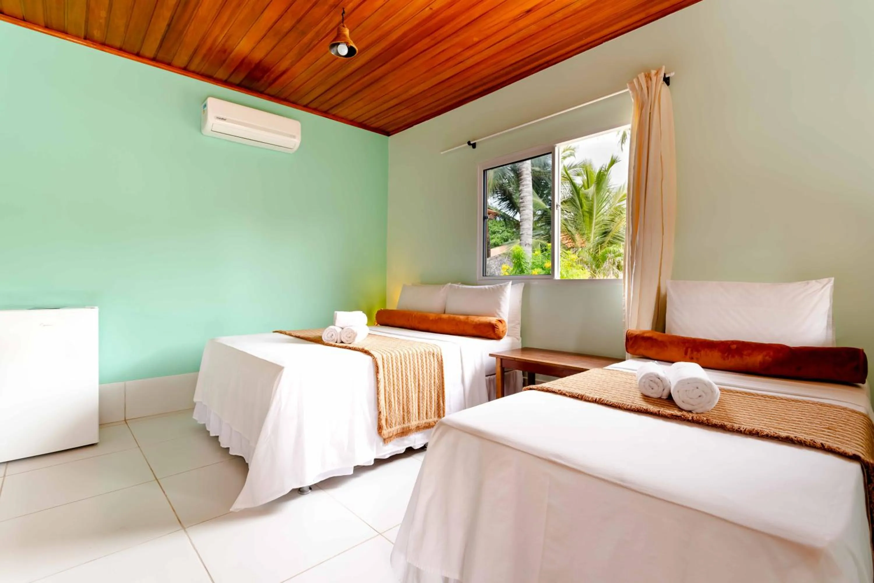 Bed in Pousada Capitão Thomaz