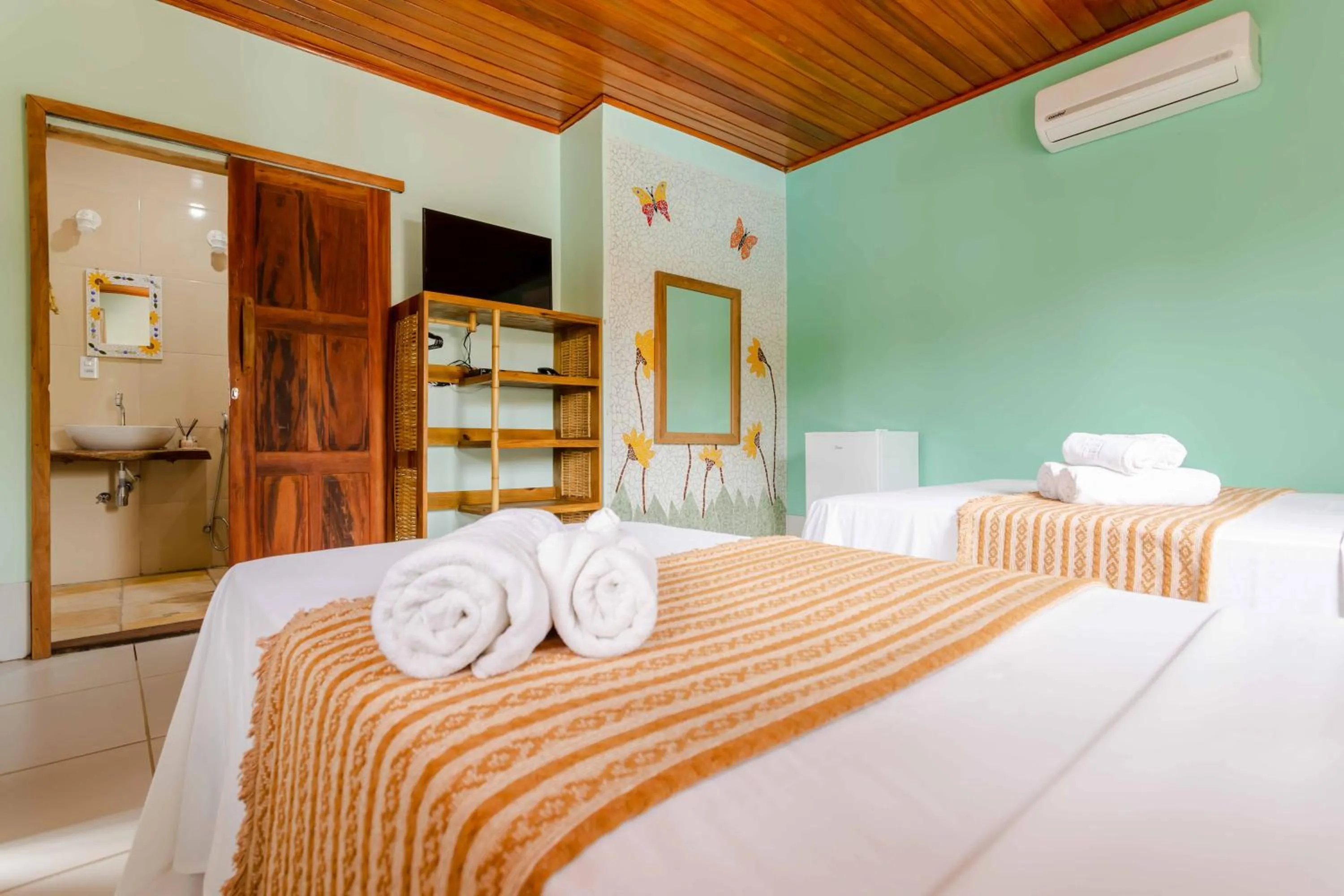 Bed in Pousada Capitão Thomaz