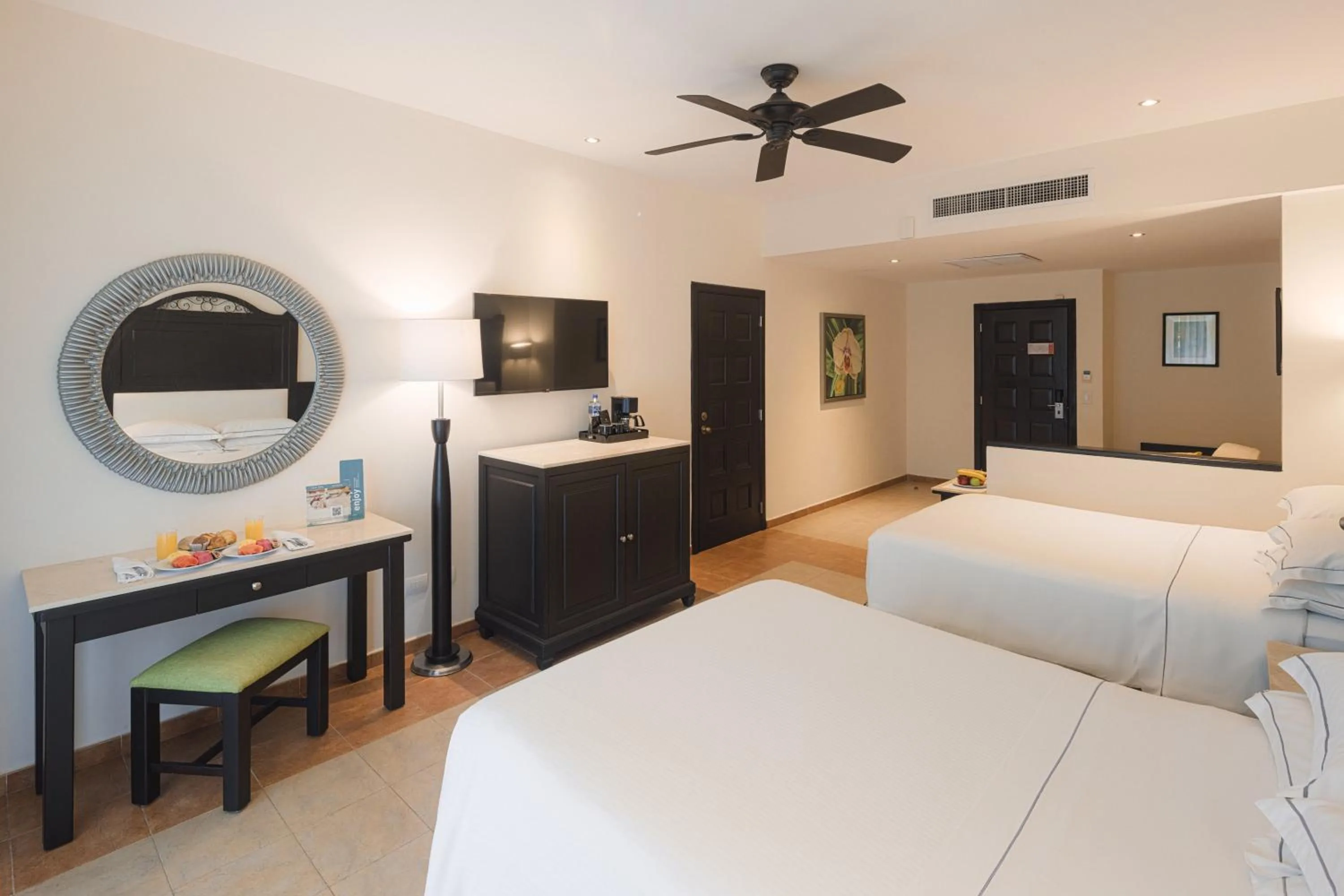 Photo of the whole room, Bed in Occidental at Xcaret Destination - All Inclusive