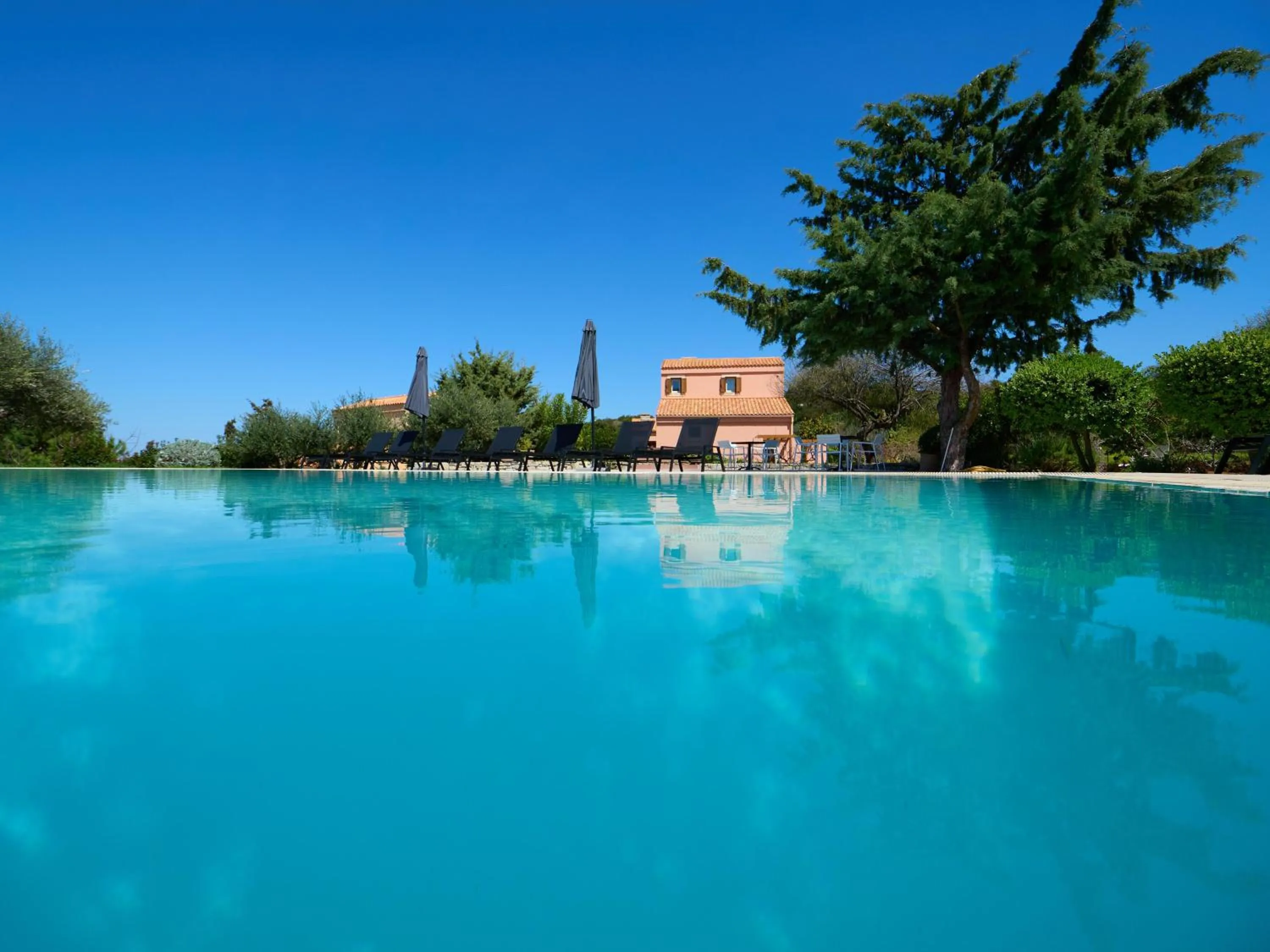 Swimming pool in Eliathos Hillside Retreat