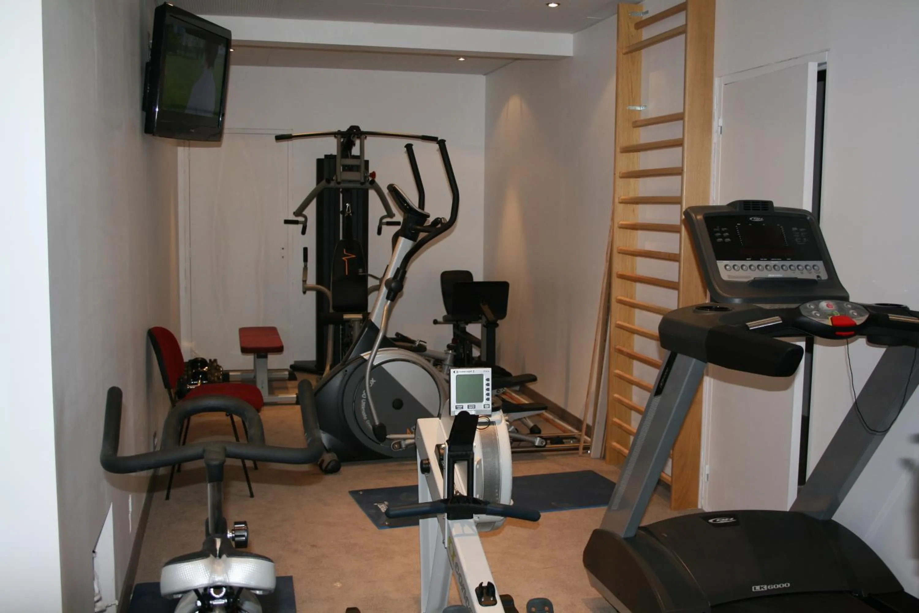 Fitness centre/facilities in Auberge de la Petite Ferme, Super-Besse Est, The Originals Relais