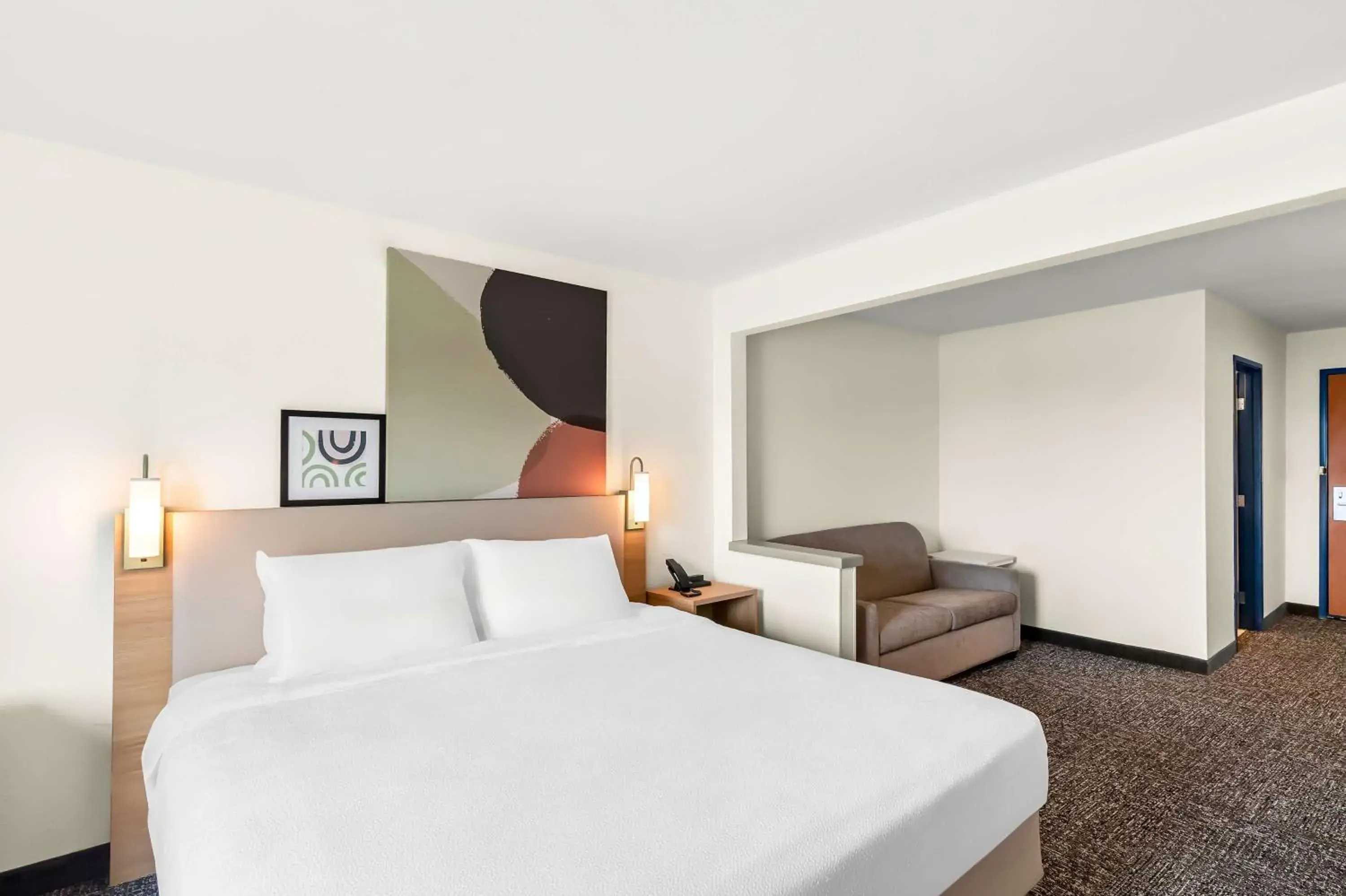 Living room, Bed in Spark by Hilton Springfield Southwest Living room, Bed in Spark by Hilton Springfield Southwest