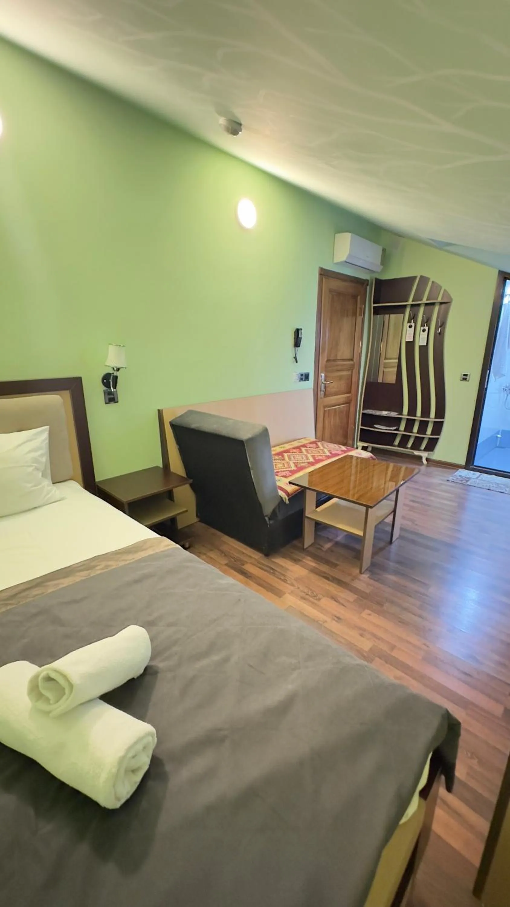 Bed in Yaffle Inn Shaki Boutique Hotel