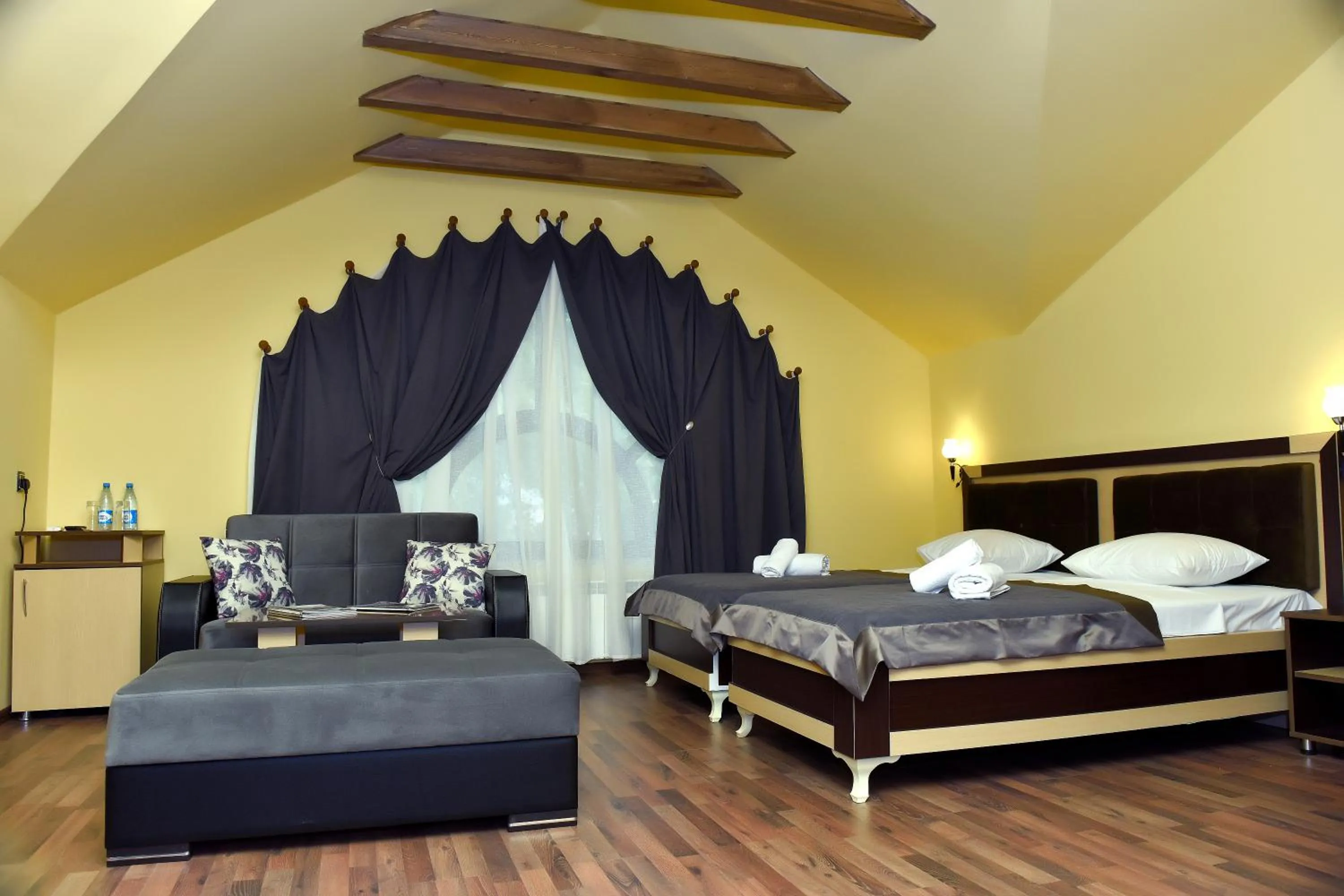 Bed in Yaffle Inn Shaki Boutique Hotel