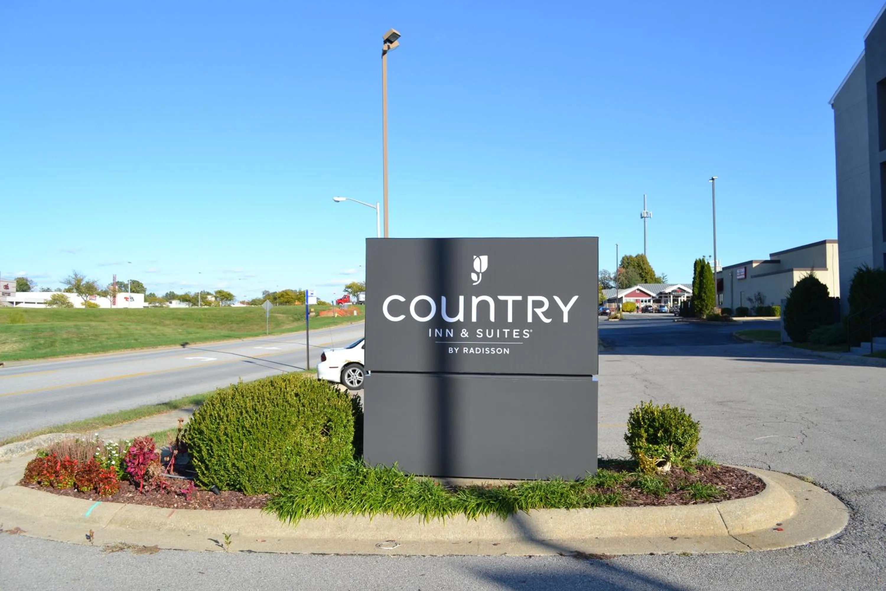 Property logo or sign in Country Inn & Suites by Radisson, Fairview Heights, IL