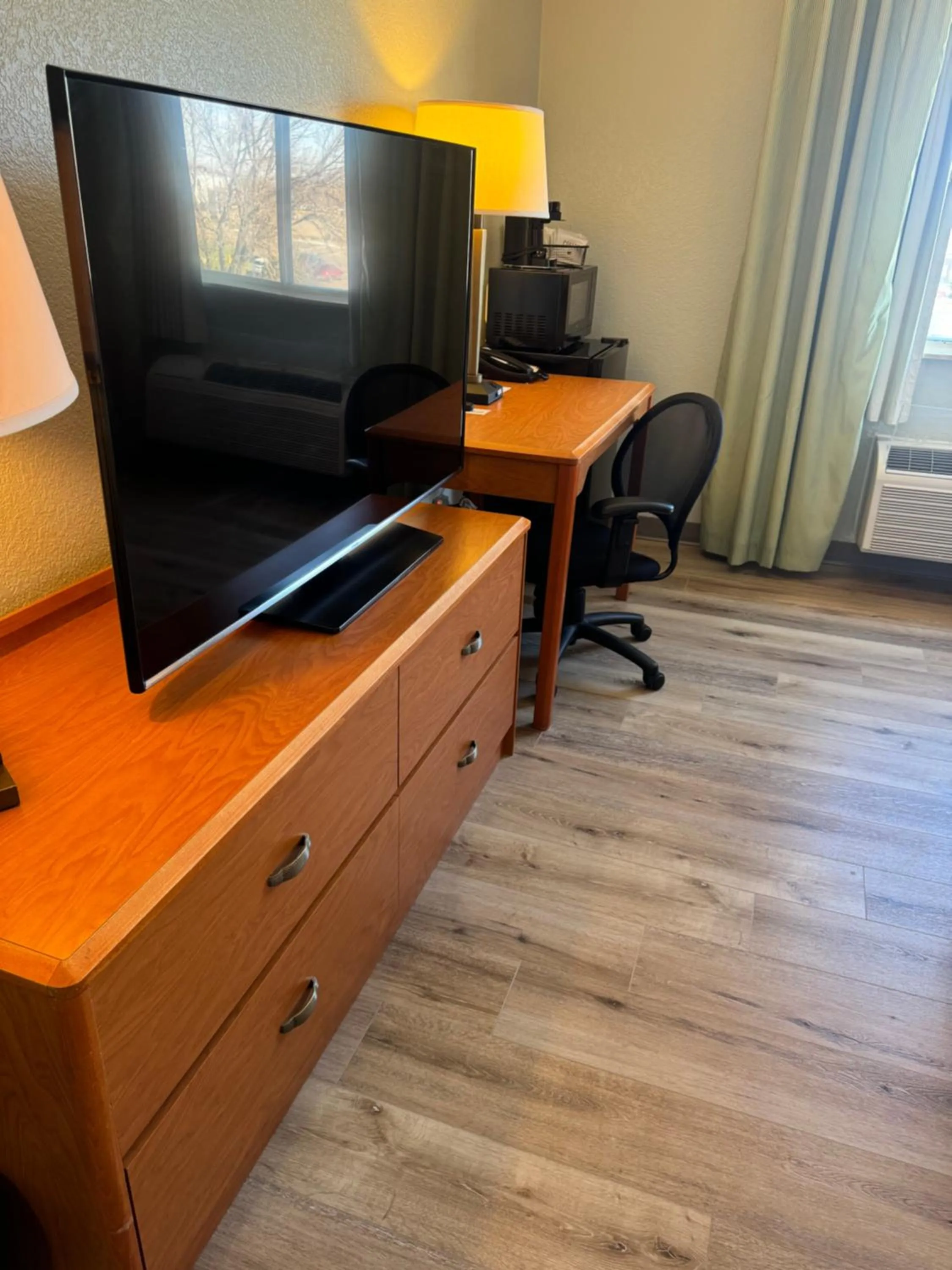 Communal lounge/ TV room in Wingate by Wyndham Sioux City