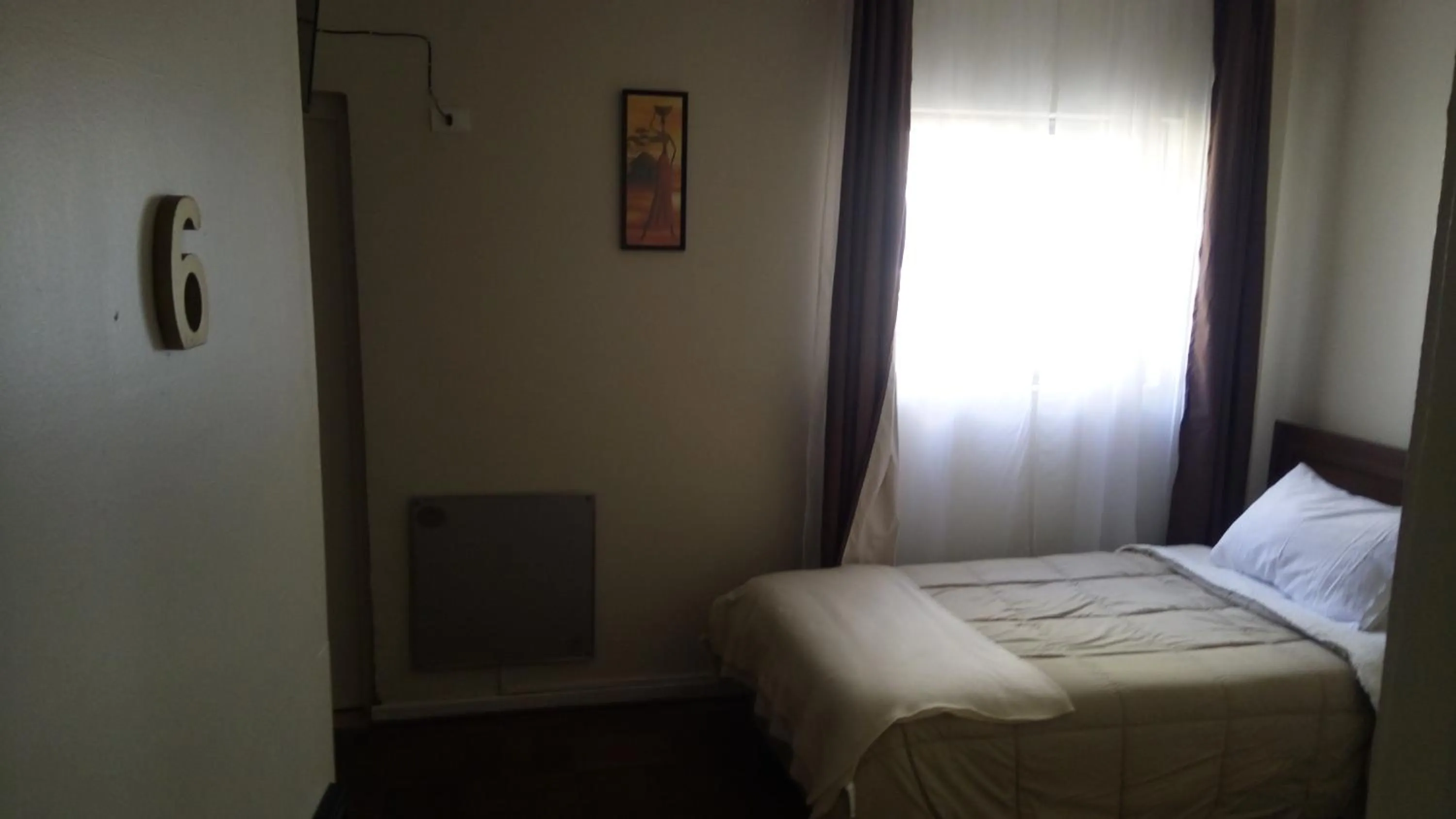 Photo of the whole room, Bed in Hostal Los Castaños