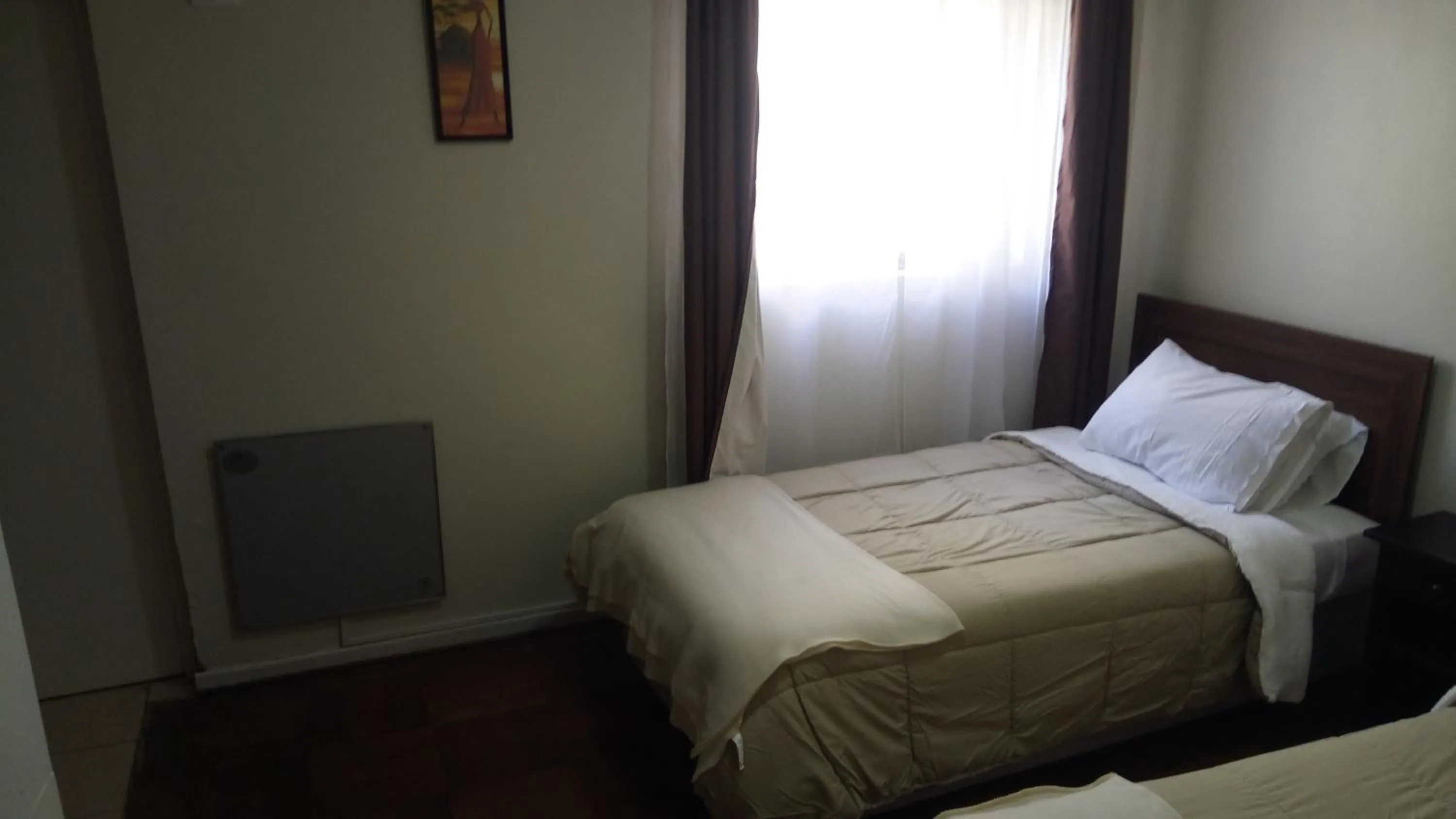 Bed in Hostal Los Castaños