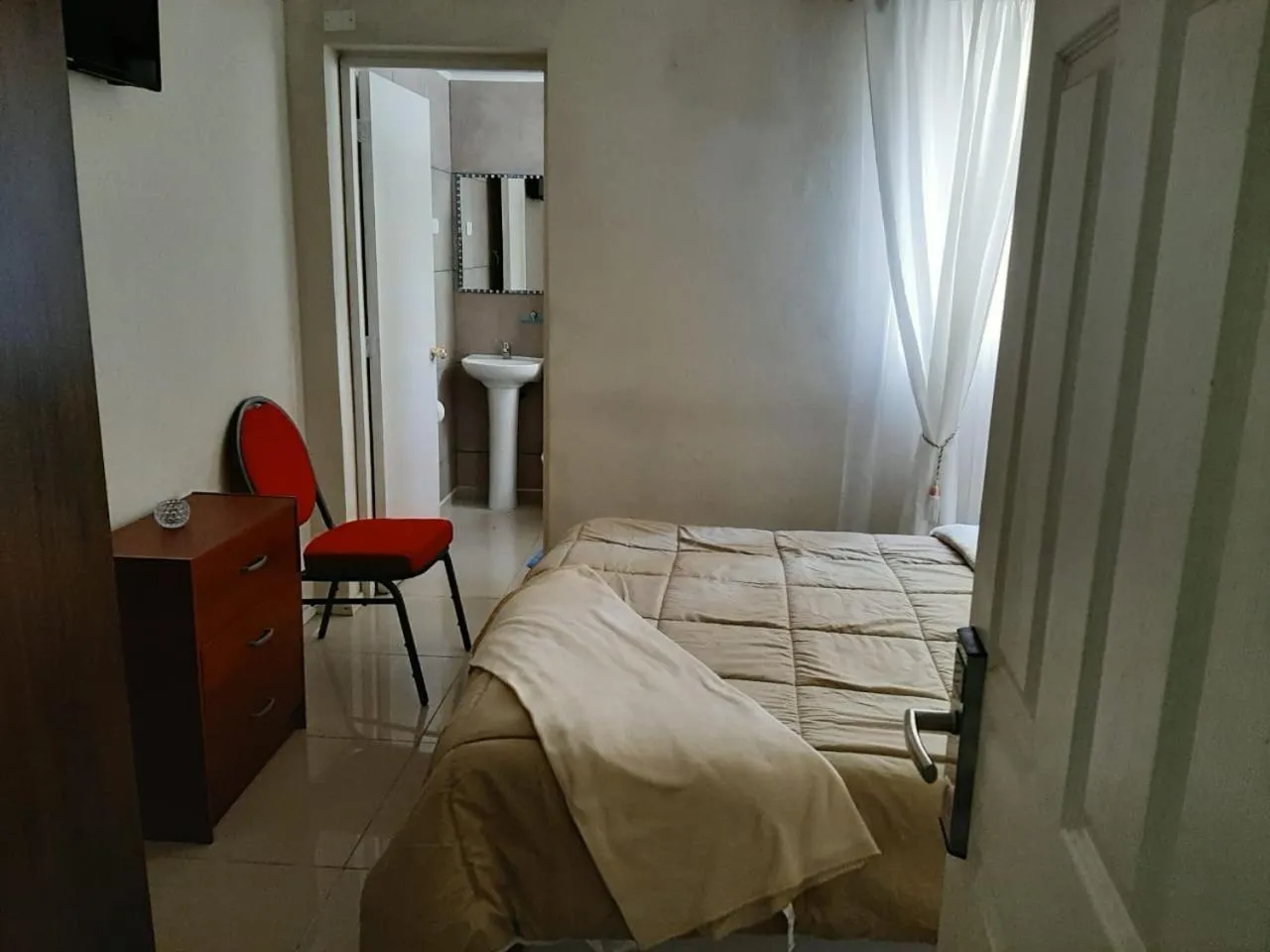Photo of the whole room, Bed in Hostal Los Castaños