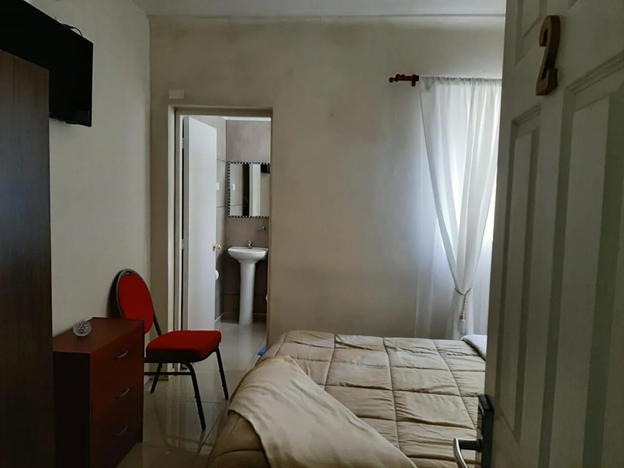 Photo of the whole room, Bed in Hostal Los Castaños