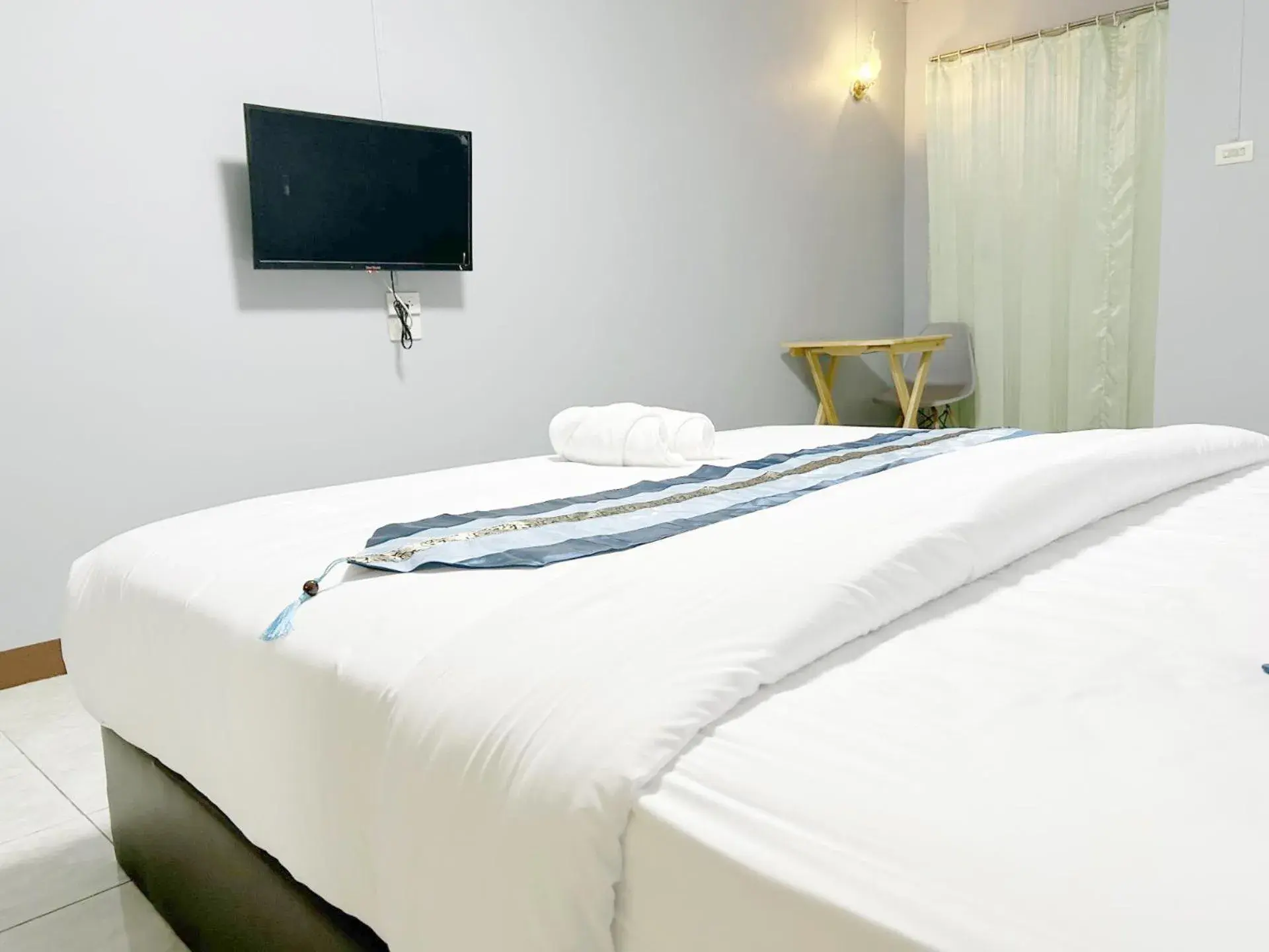 Bed in Goody Hotel Bed in Goody Hotel