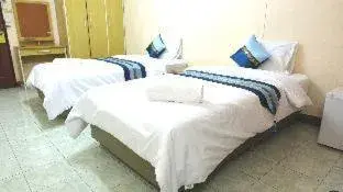 Bed in Goody Hotel Bed in Goody Hotel