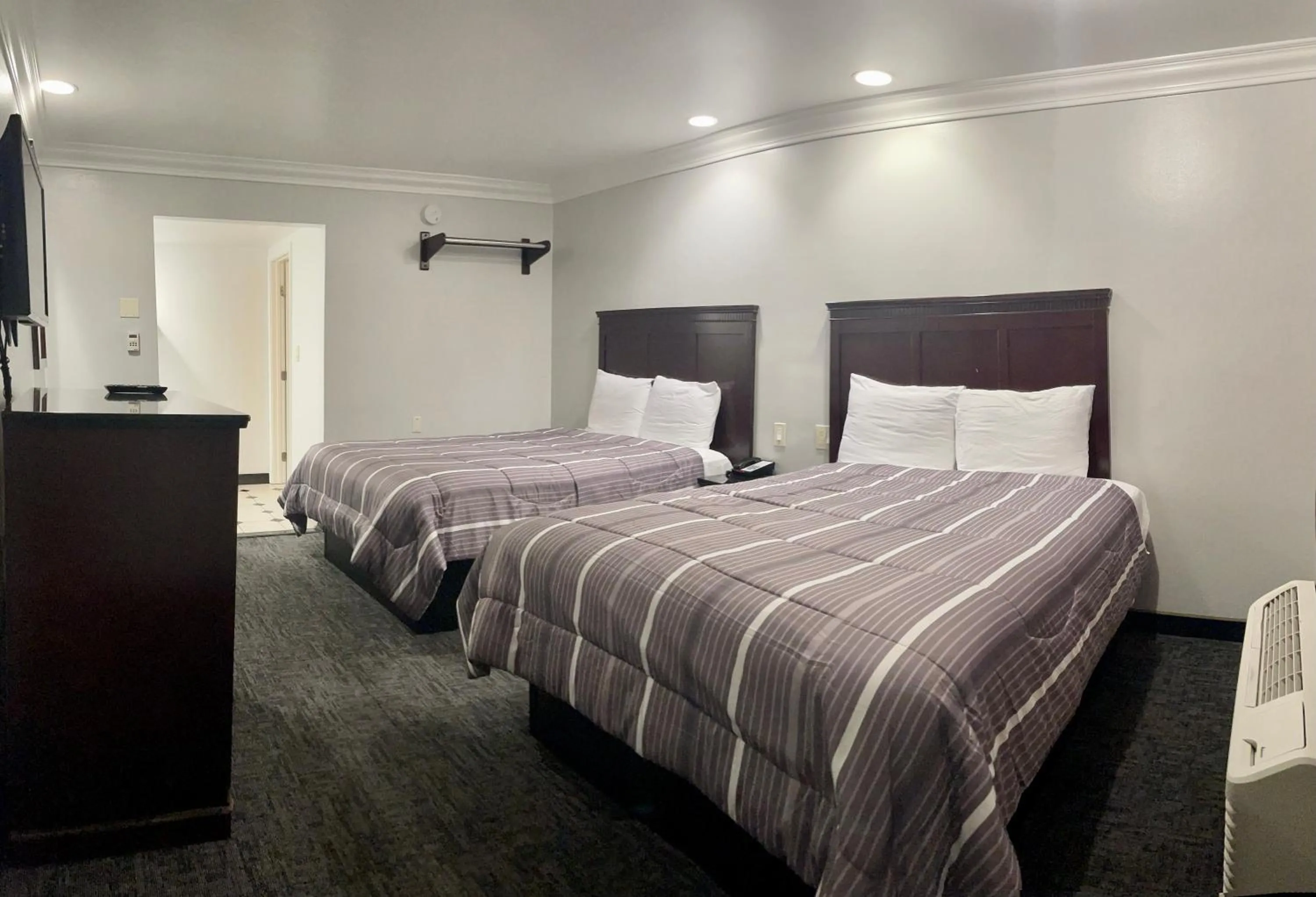 Bed in Capital City Inn Downtown Convention Center