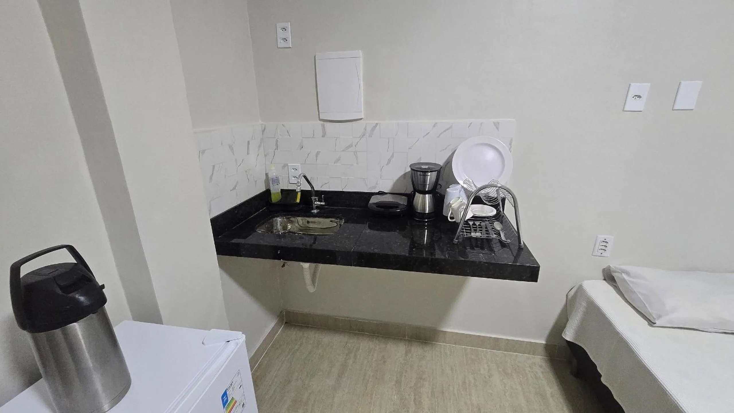 Kitchen or kitchenette in Recanto Del Mare Suítes