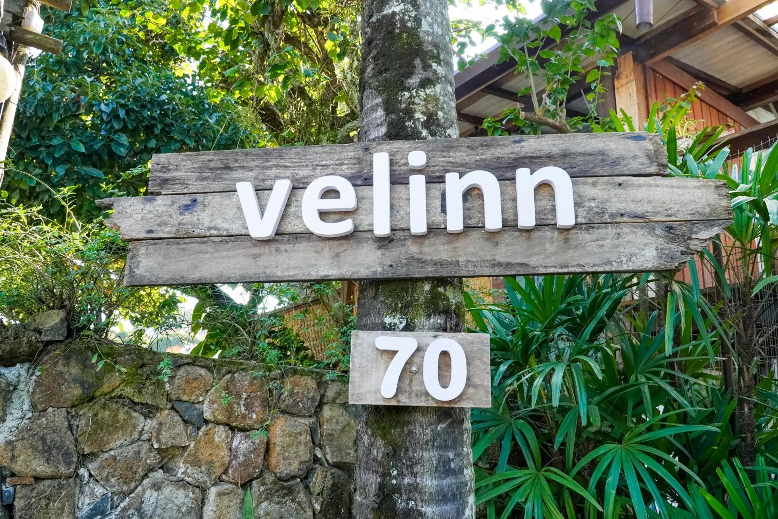 Property logo or sign in VELINN Caravela Pousada Ilhabela