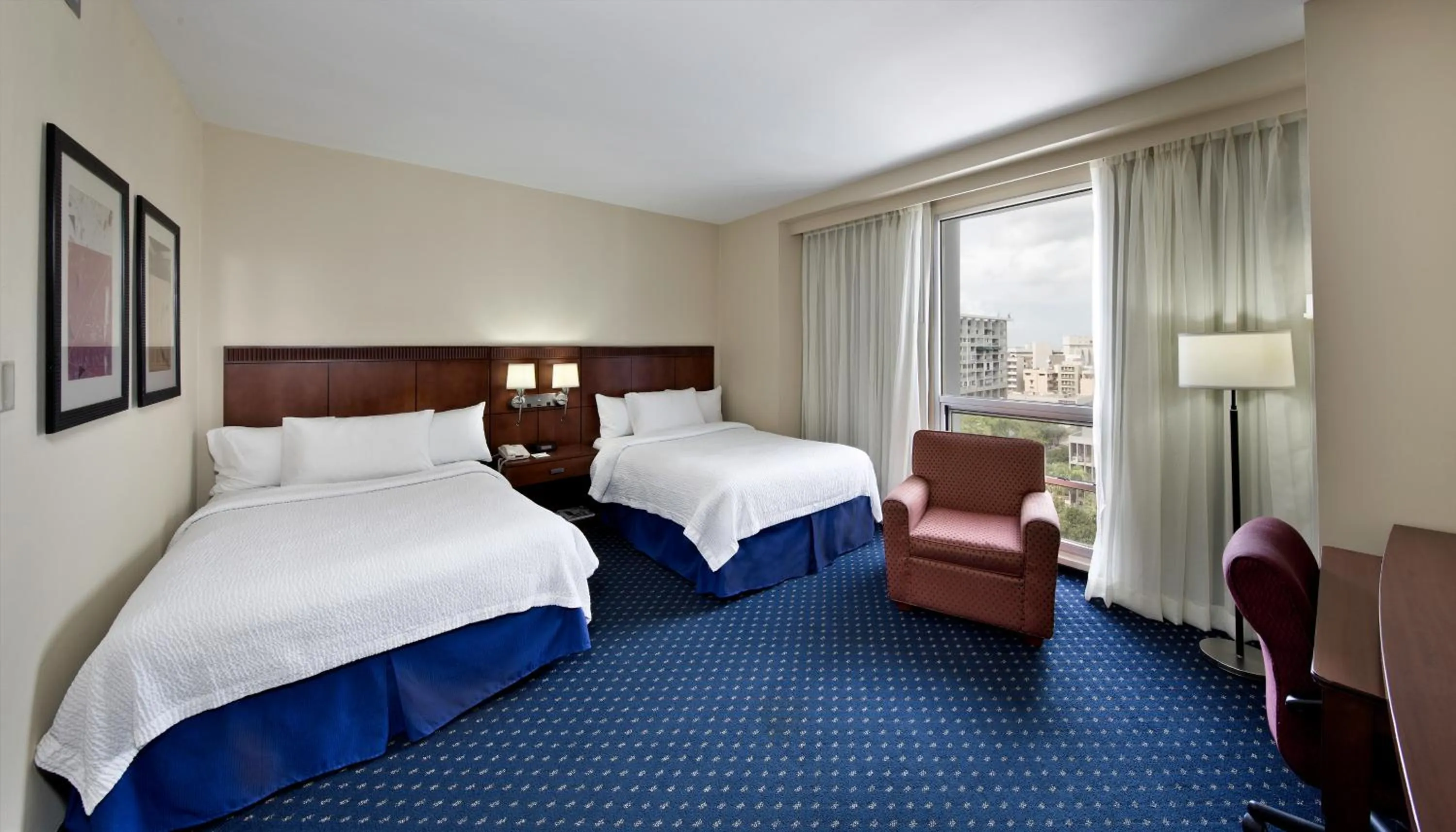 Bed in Courtyard by Marriott San Juan Miramar