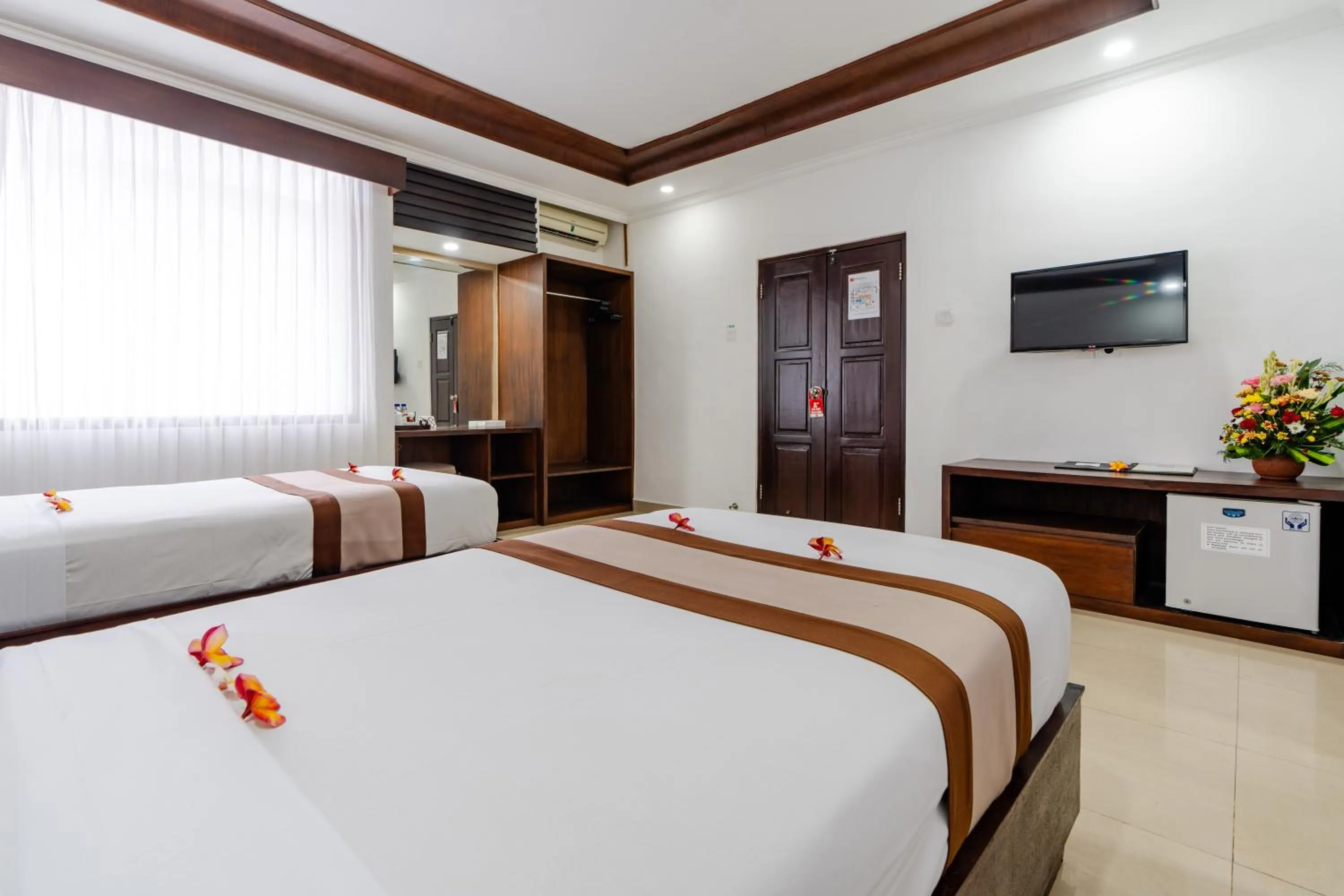 Bedroom, Bed in Dewi Sri Hotel