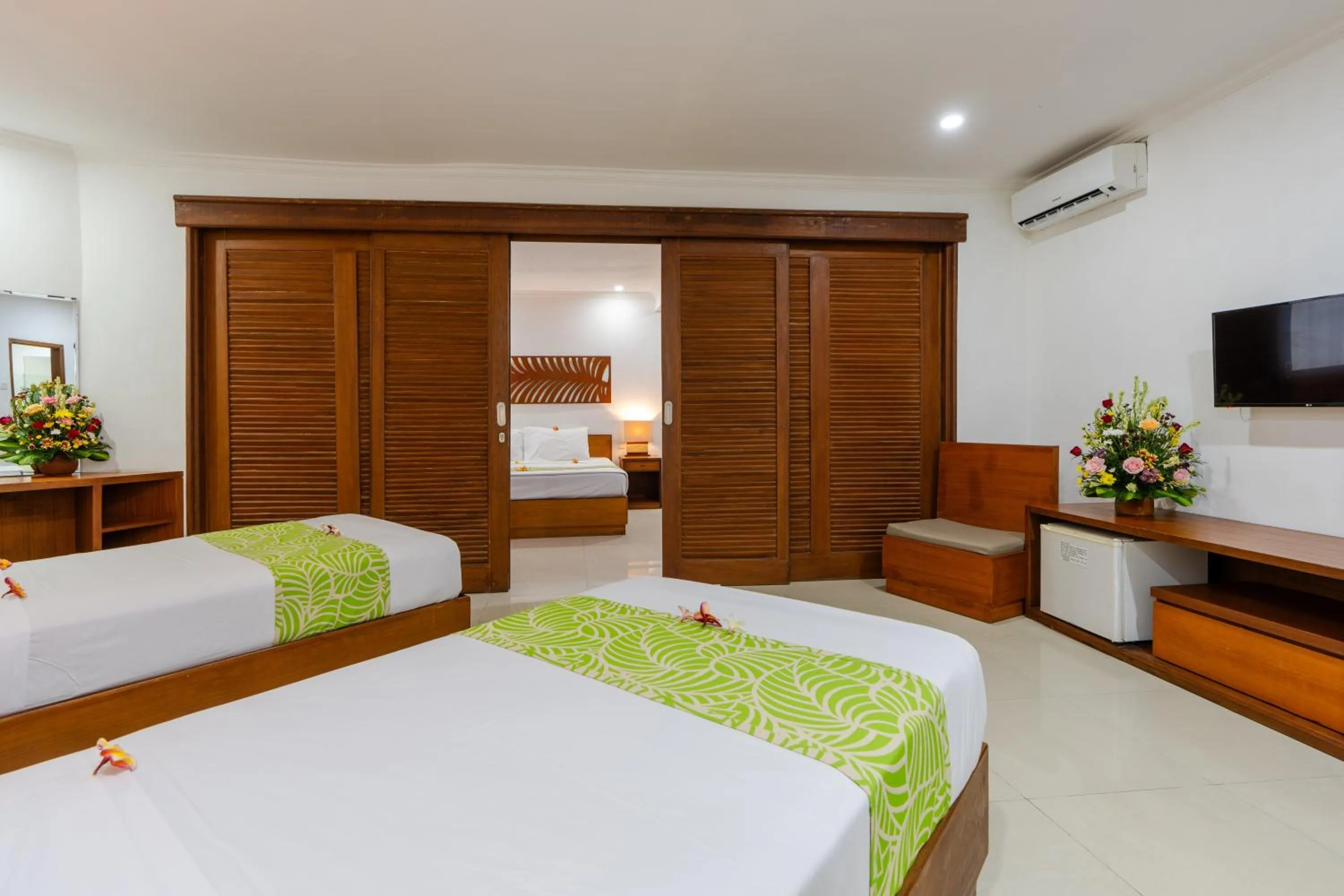 Photo of the whole room, Bed in Dewi Sri Hotel