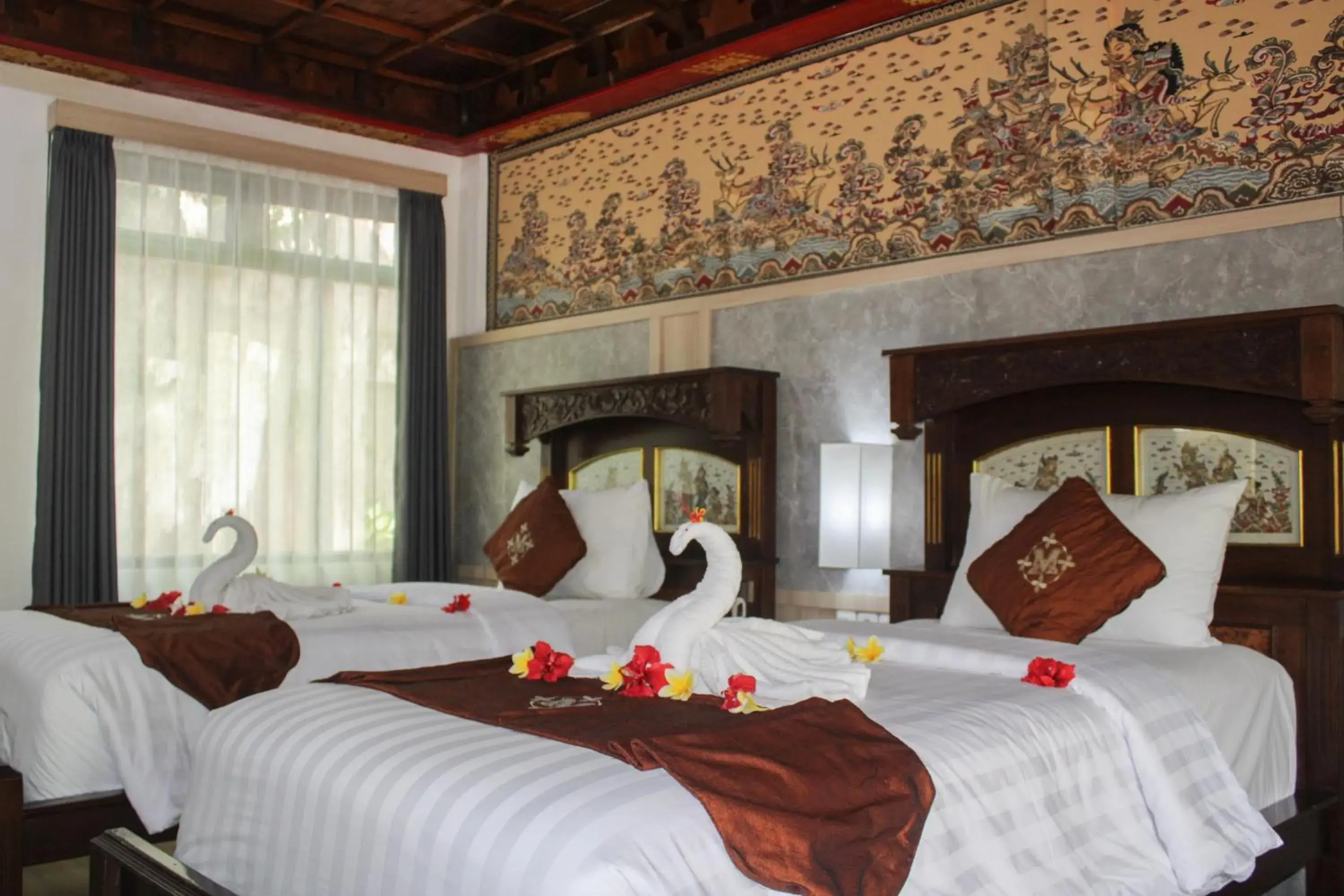 Bed in Melasti Kuta Beach Hotel & Spa Bed in Melasti Kuta Beach Hotel & Spa