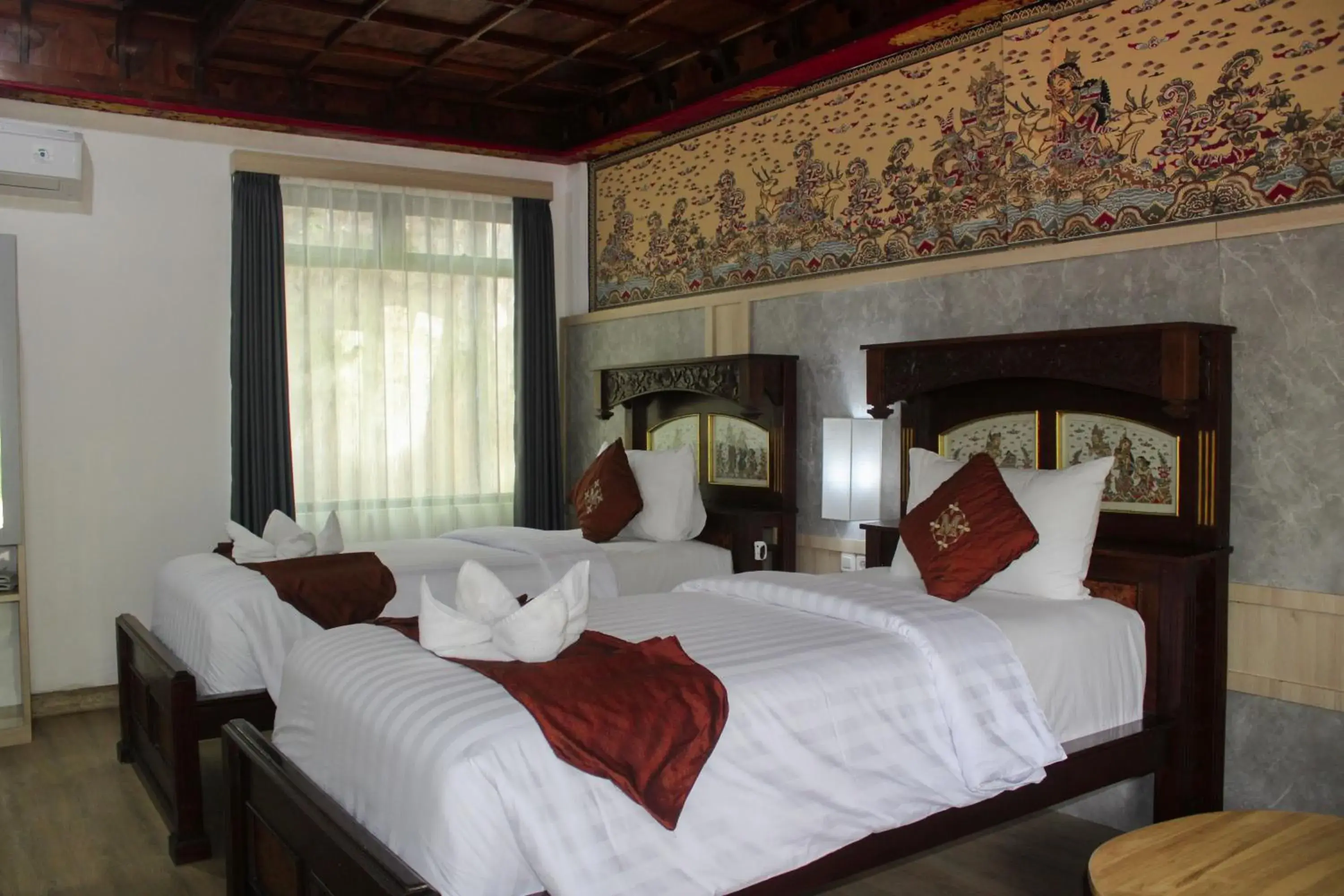 Bed in Melasti Kuta Beach Hotel & Spa Bed in Melasti Kuta Beach Hotel & Spa