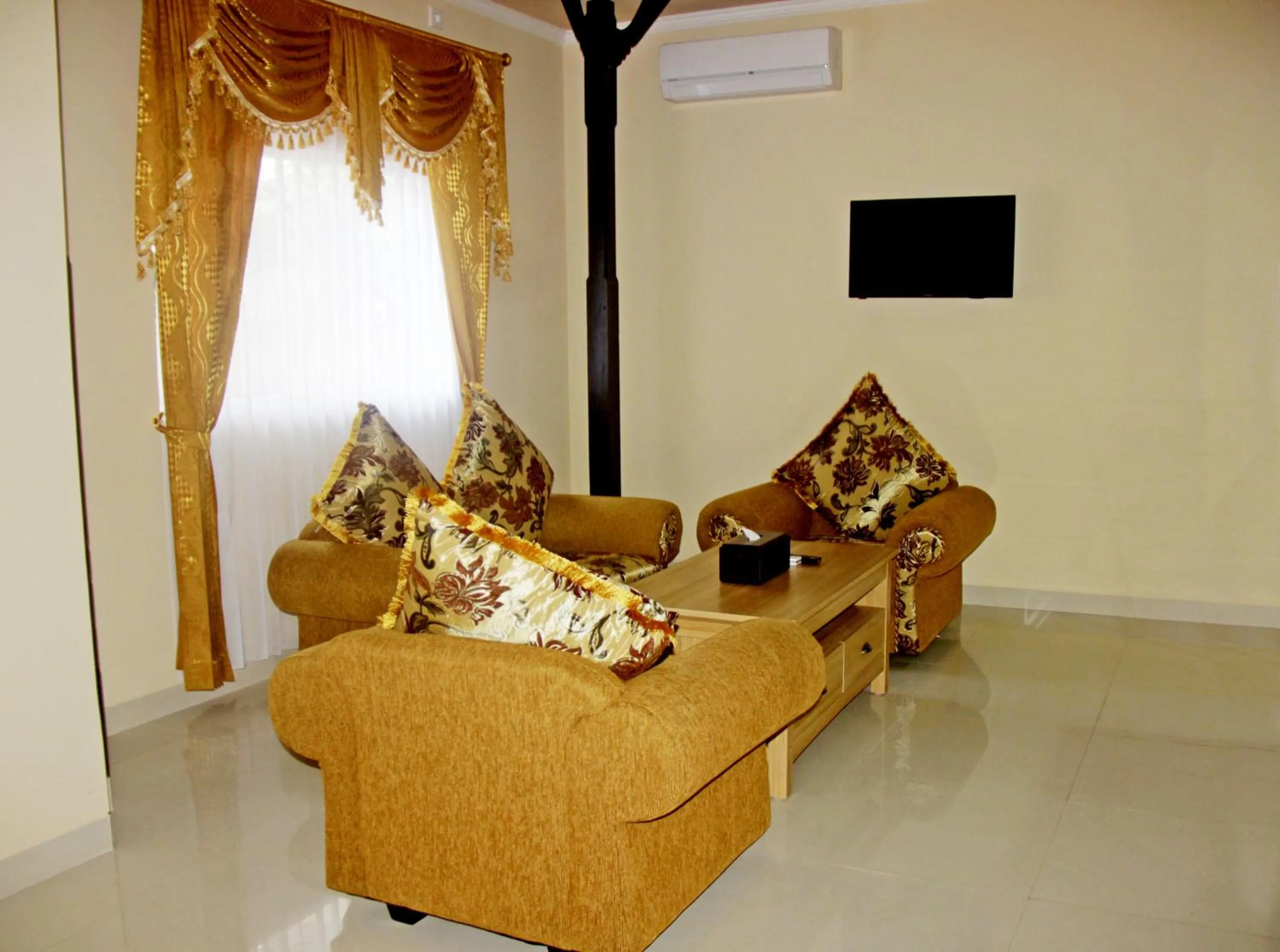 Living room in Melasti Beach Resort & Spa Legian