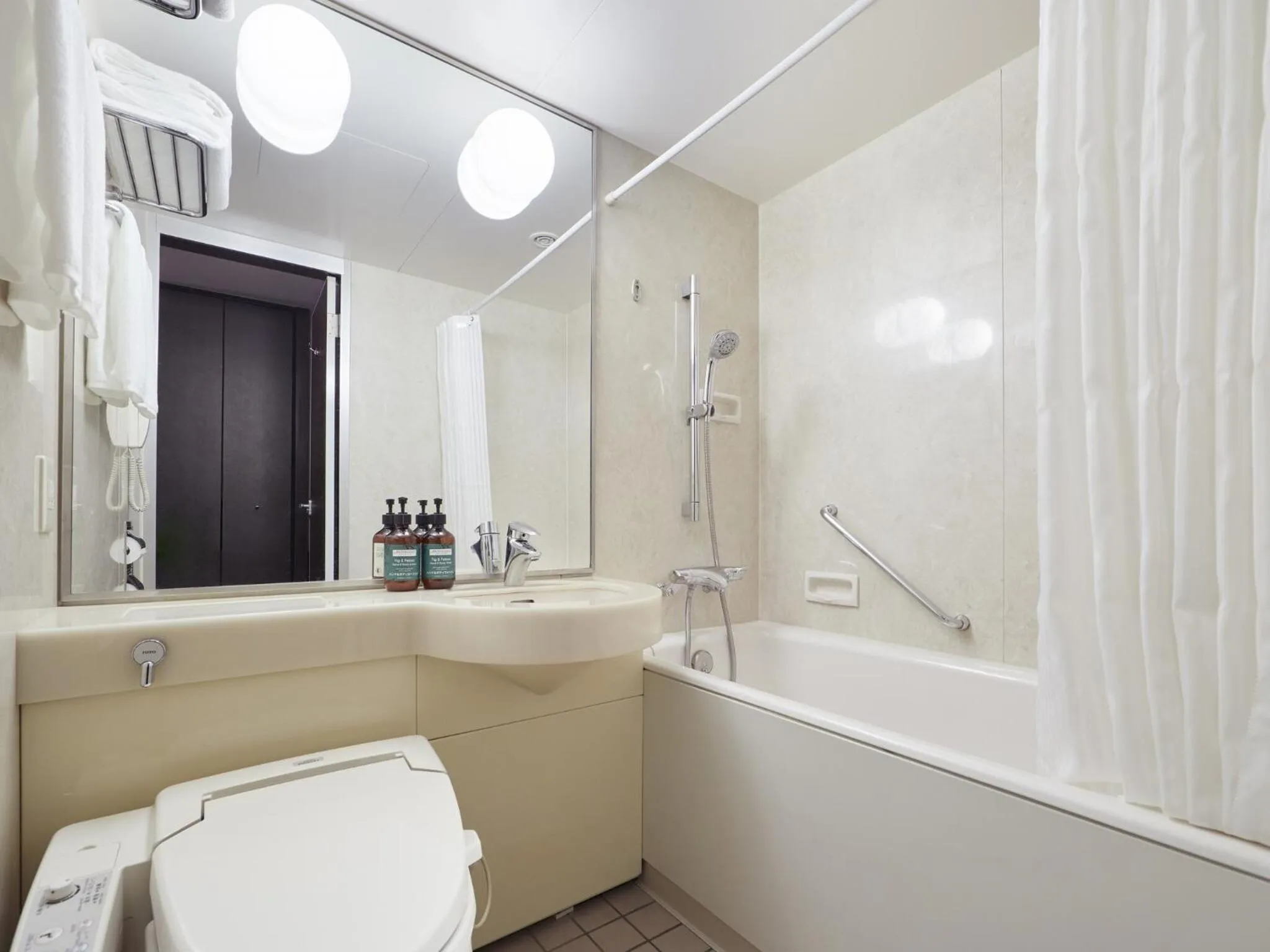 Bathroom in ANA Crowne Plaza Chitose by IHG