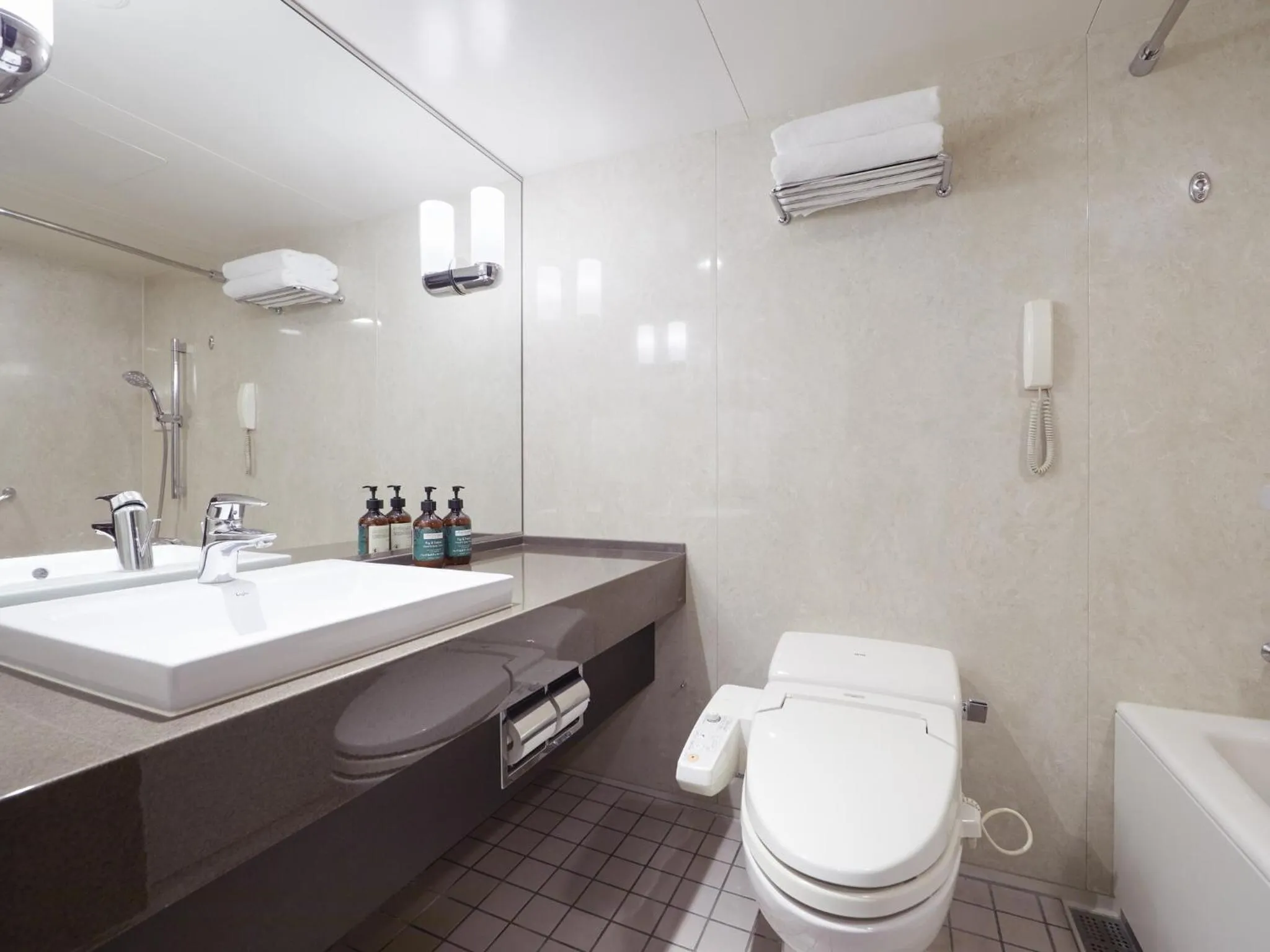 Bathroom in ANA Crowne Plaza Chitose by IHG