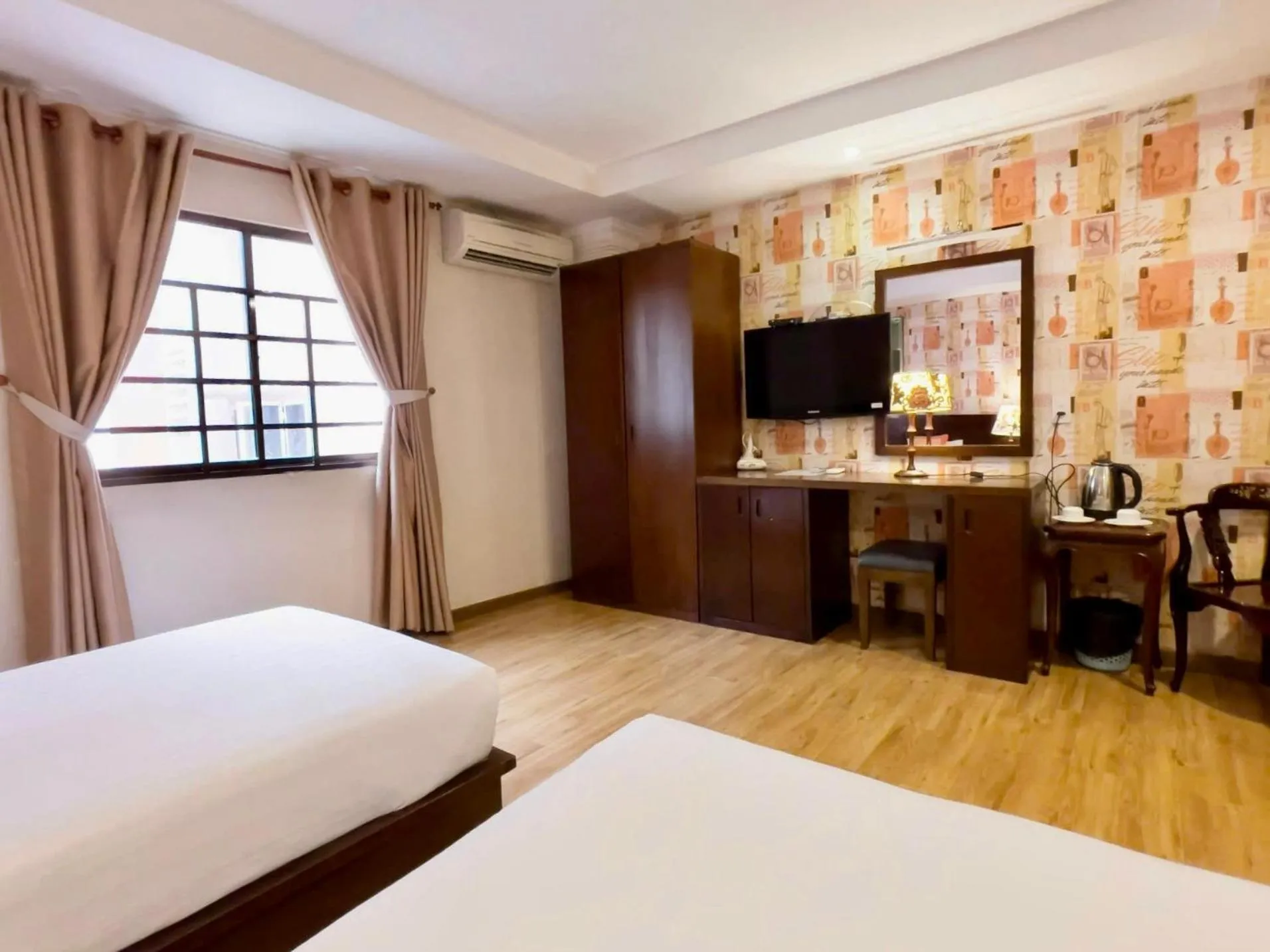 Bed in Little Brick Saigon Hotel