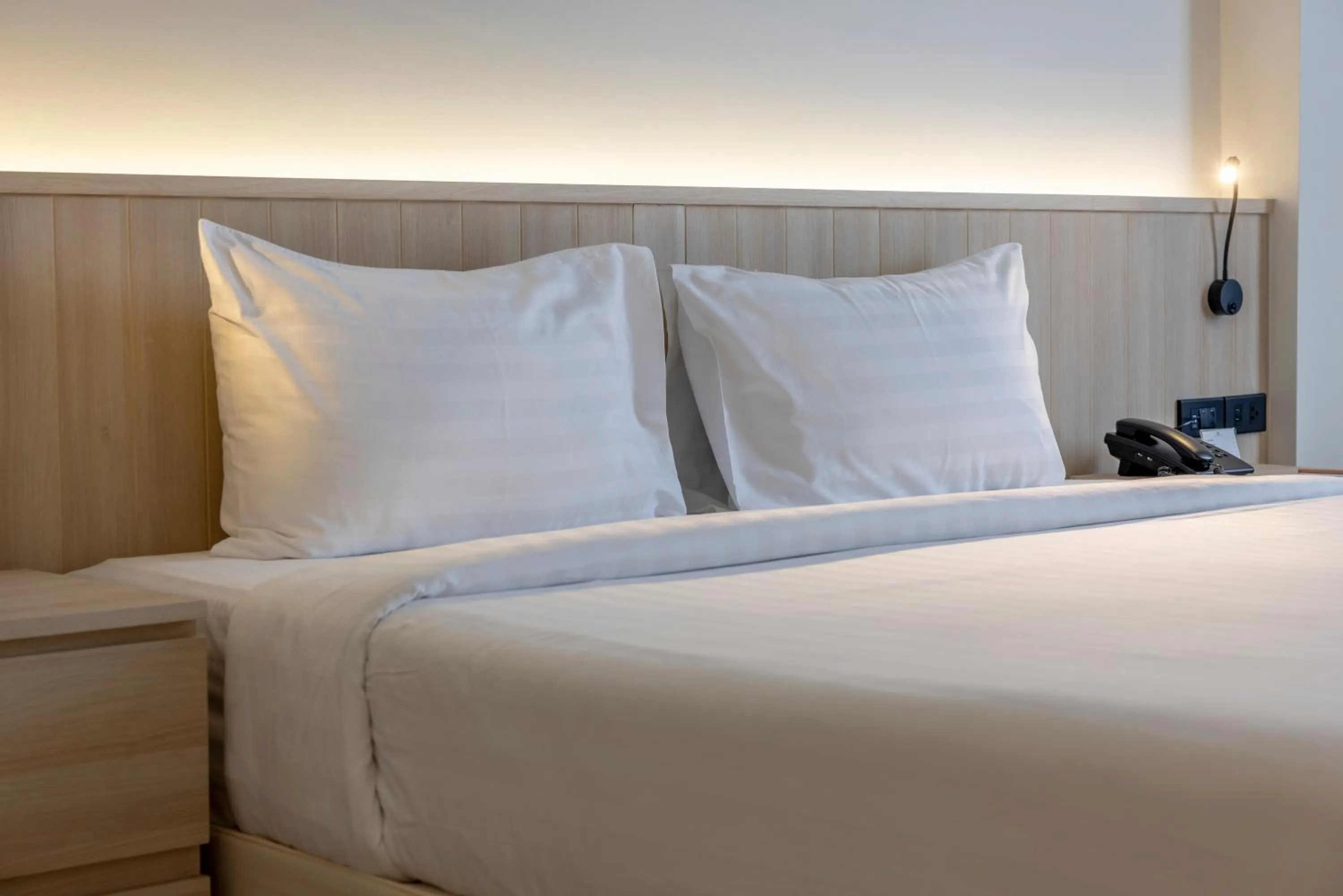 Bed in The Maruay Garden Hotel