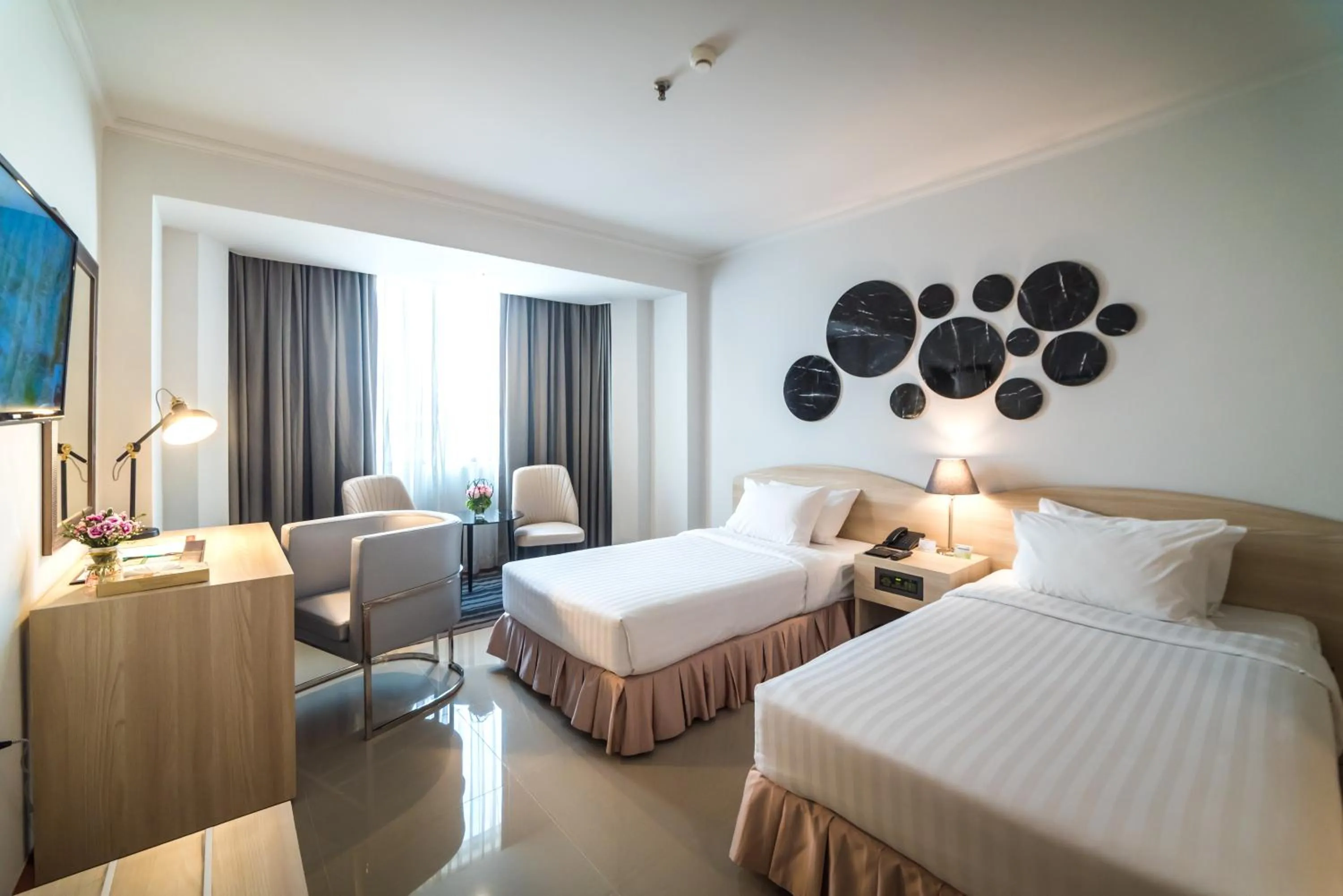 Bed in The Maruay Garden Hotel