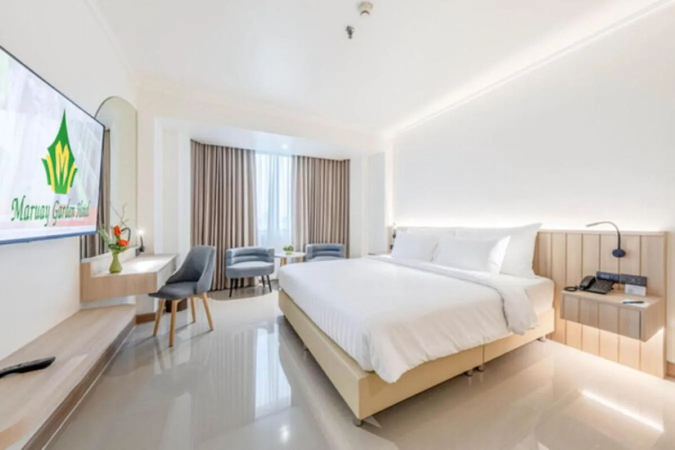 Bed in The Maruay Garden Hotel