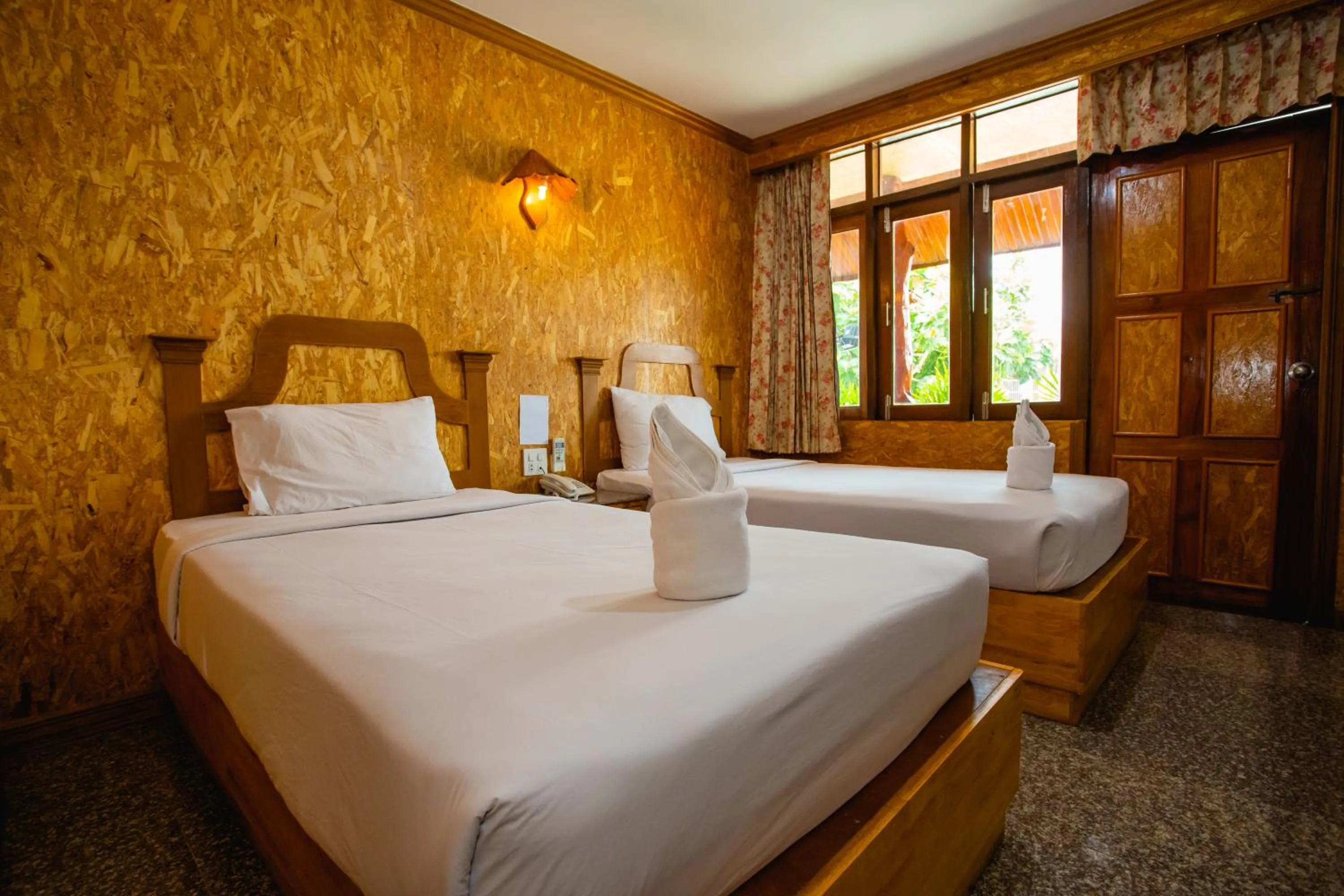 Bed in Chatsuree Boutique Resort