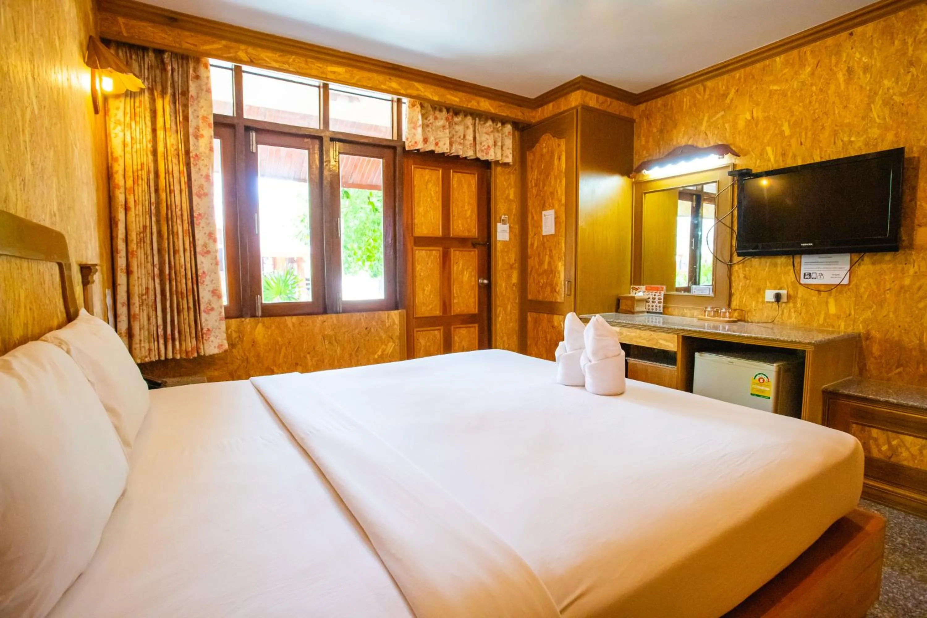 Bed in Chatsuree Boutique Resort
