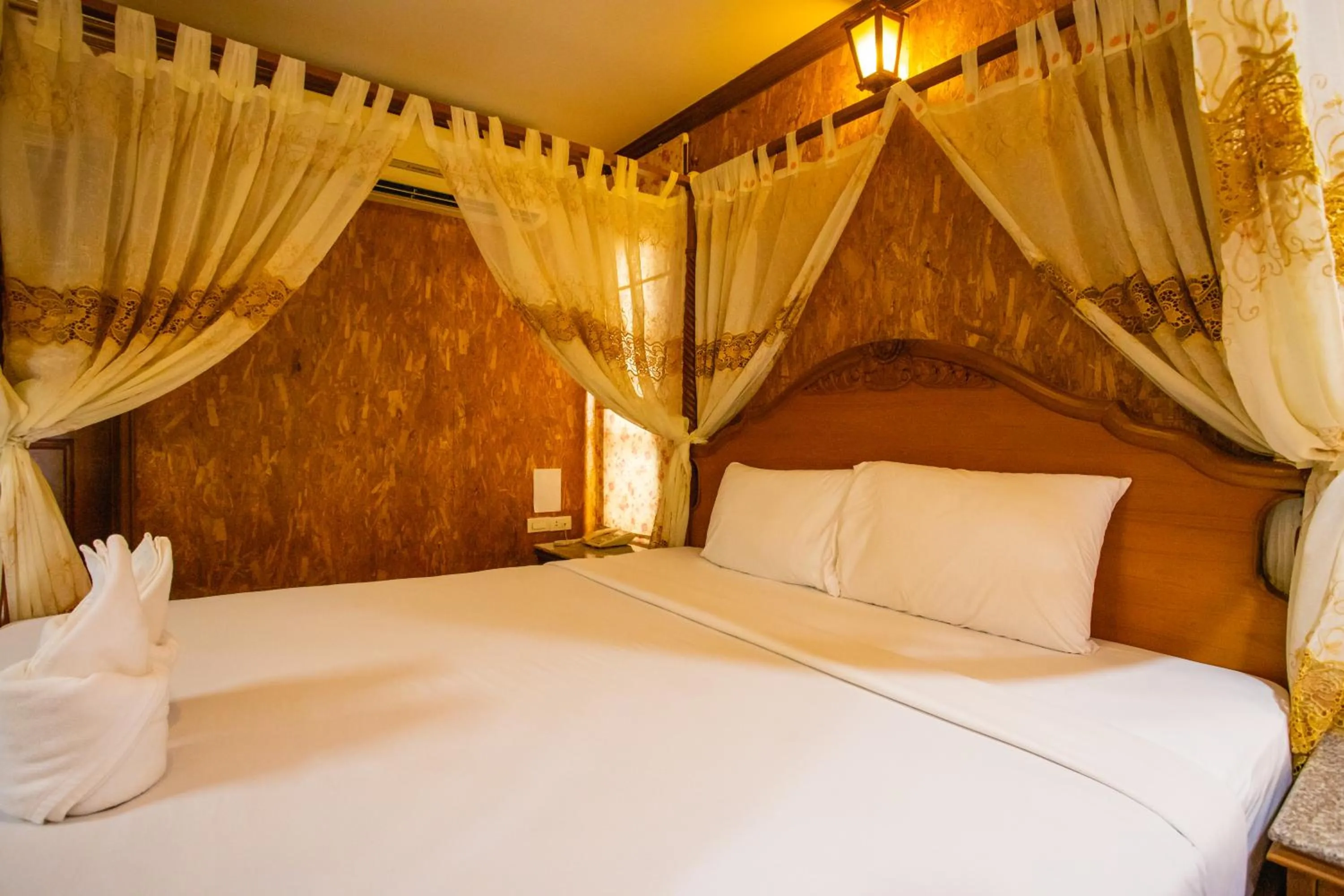 Bed in Chatsuree Boutique Resort