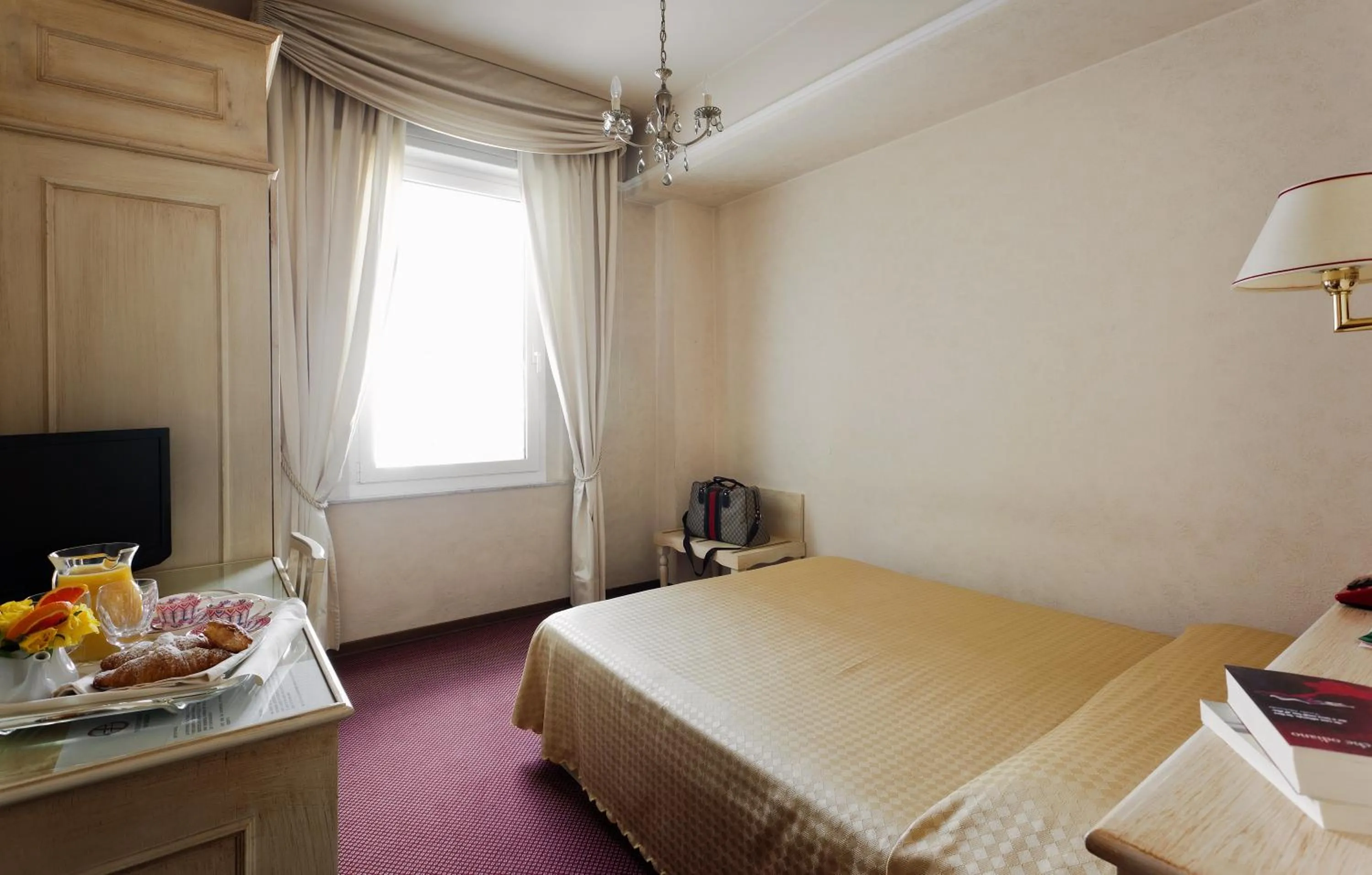 Bed in Hotel Ercolini & Savi