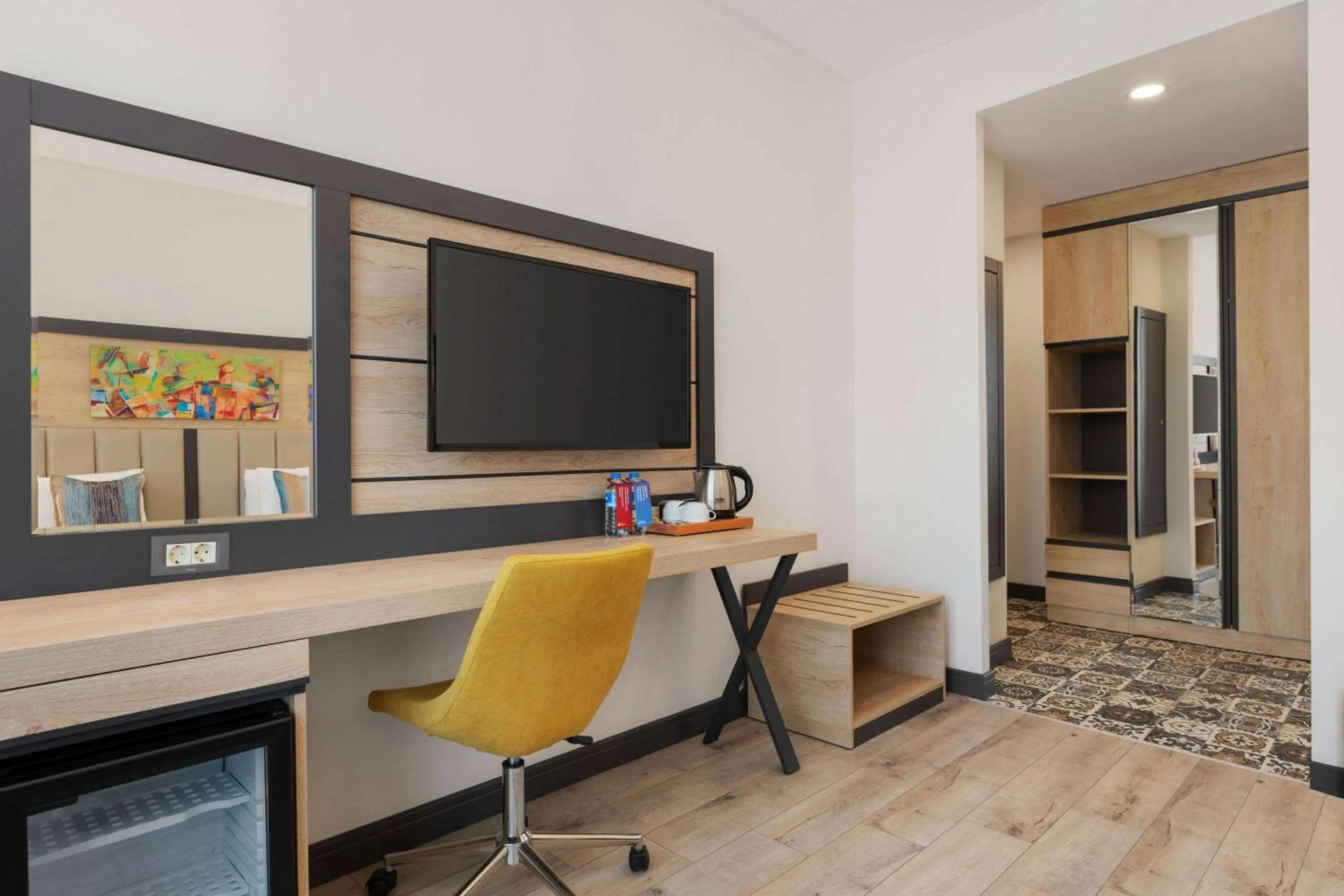 Photo of the whole room in Ramada Encore By Wyndham Istanbul Basin Express