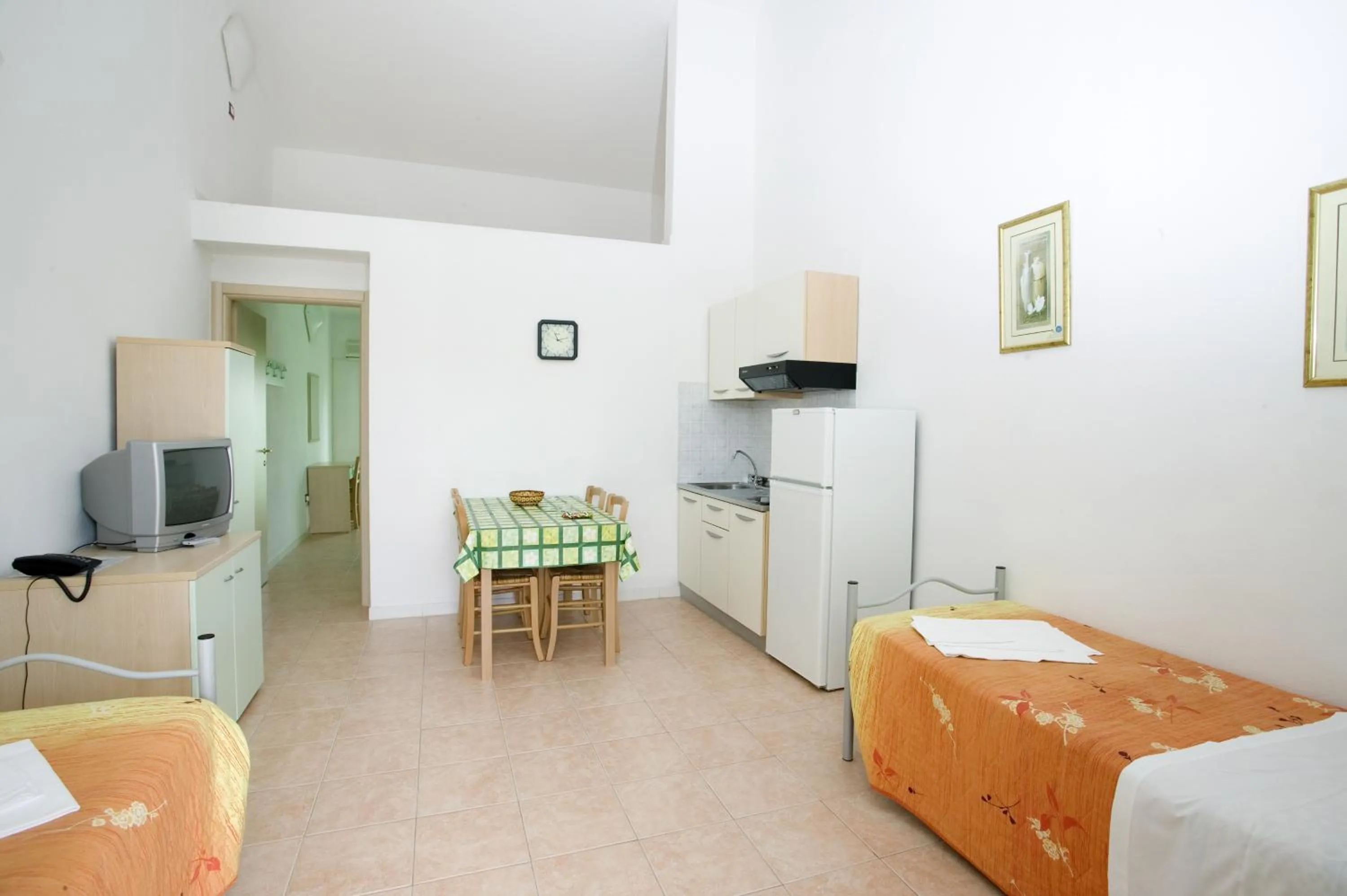 Kitchen or kitchenette, Bed in Long Beach Village Residence on the sea with private beach included