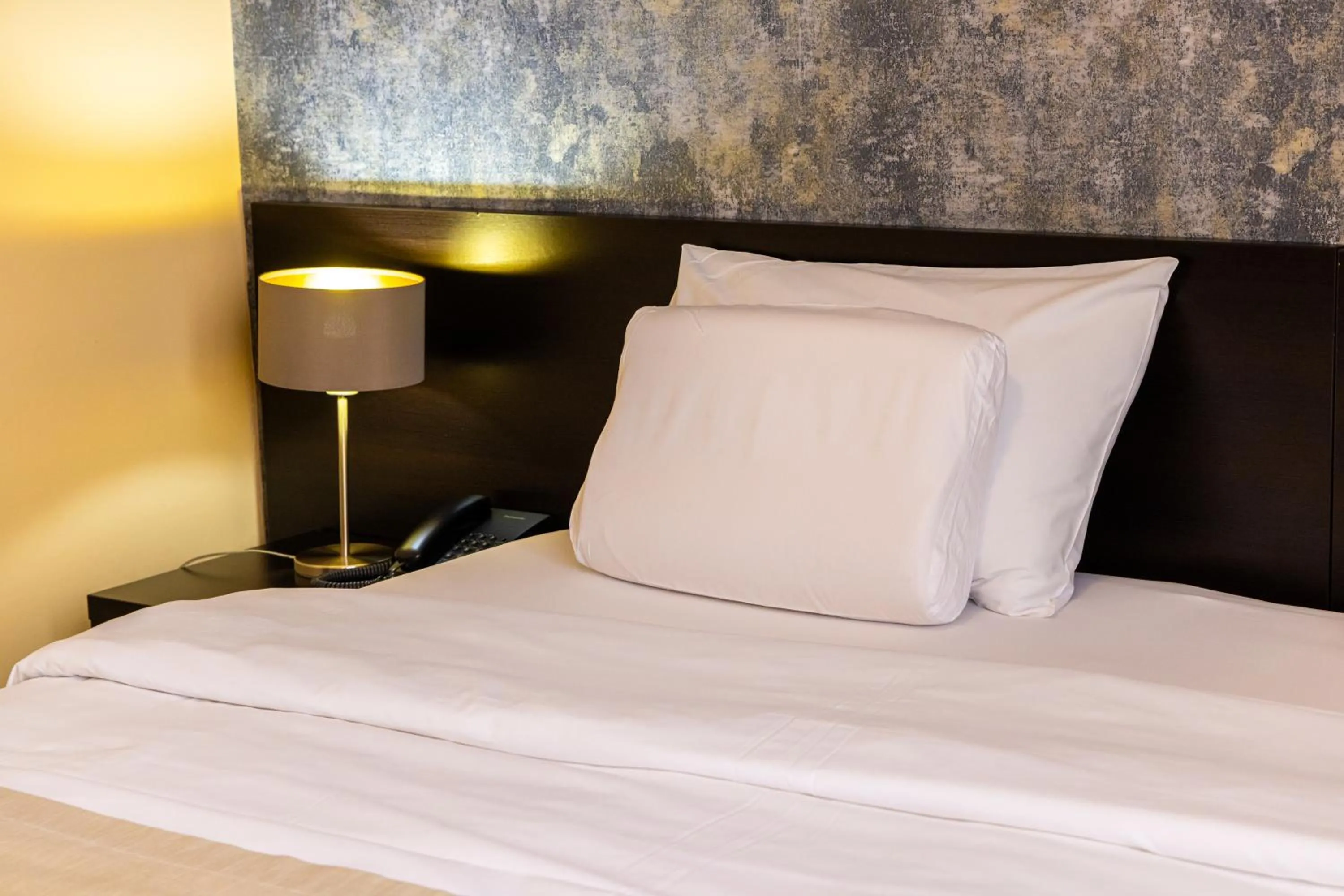 Bed in Garni Hotel Nevski