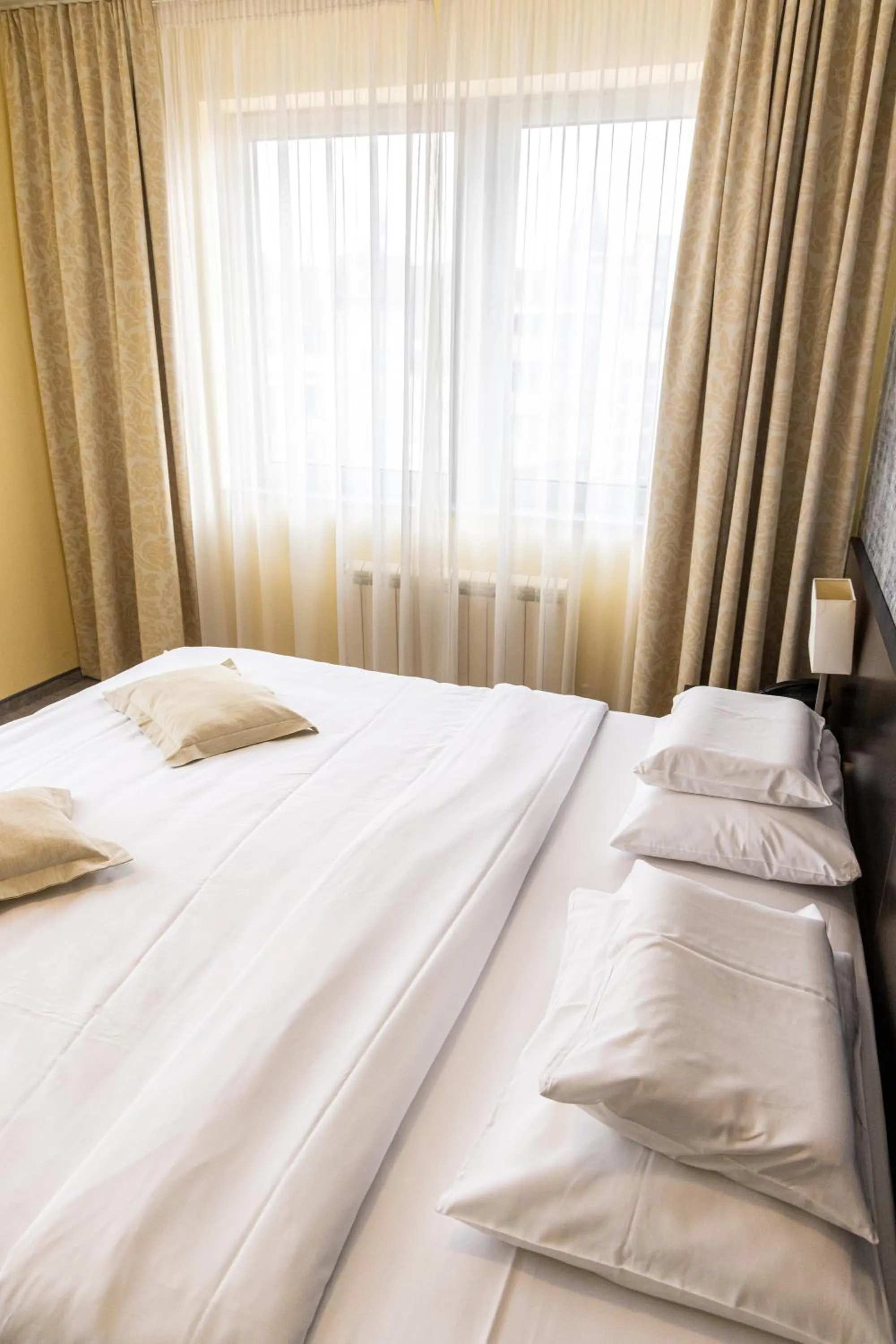 Bed in Garni Hotel Nevski