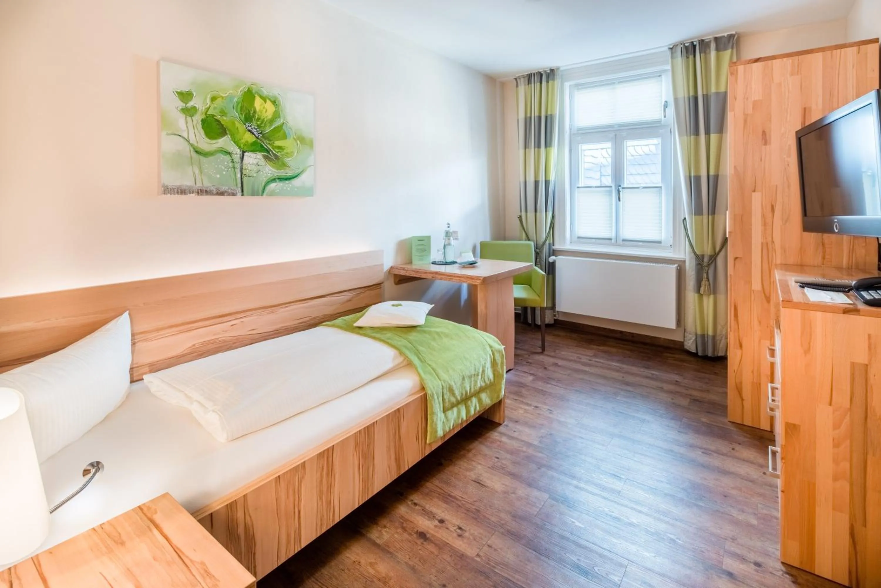 Seating area, Bed in GDA Hotel Schwiecheldthaus