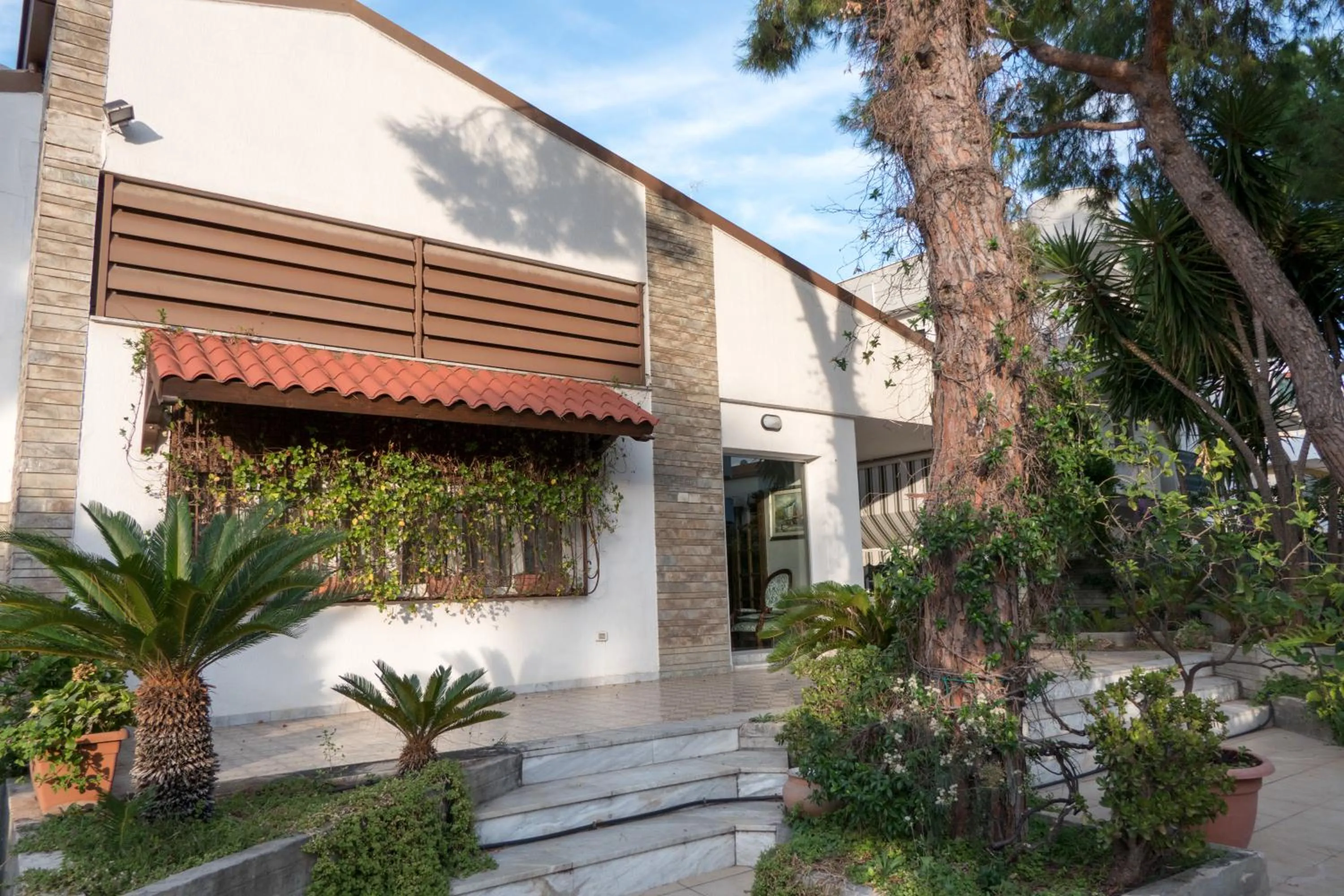 Property building in Yucca Camere & Suite