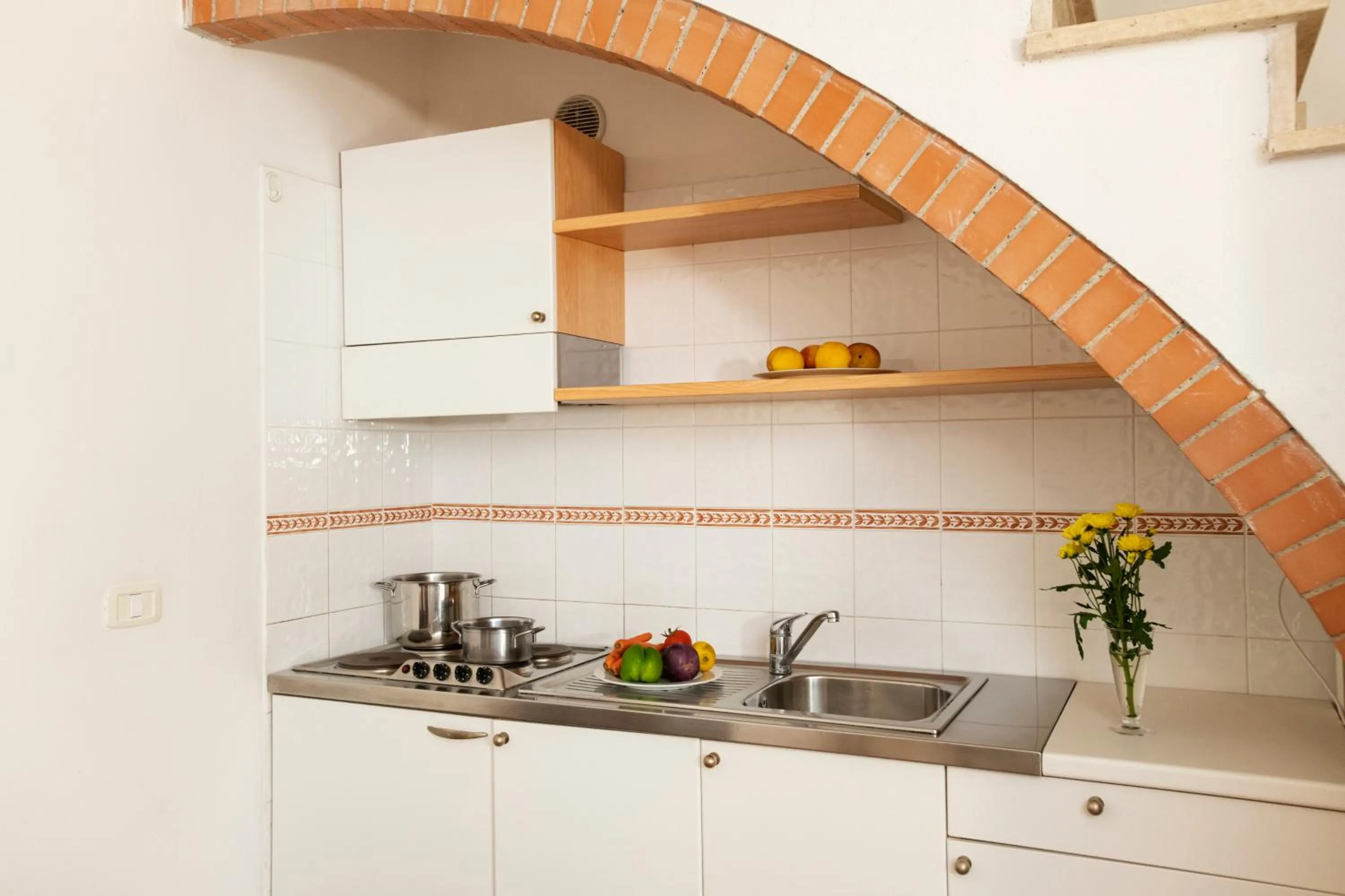 Kitchen or kitchenette in Borgo San Antonio & Borgo San Giuseppe by La Principina