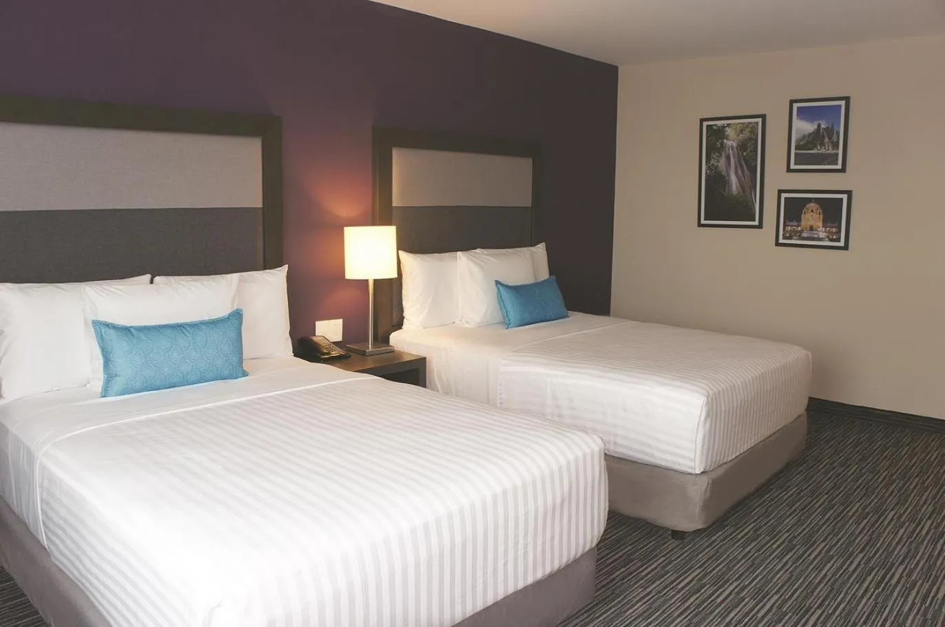 Photo of the whole room, Bed in CHN Hotel Monterrey Aeropuerto, Trademark by Wyndham