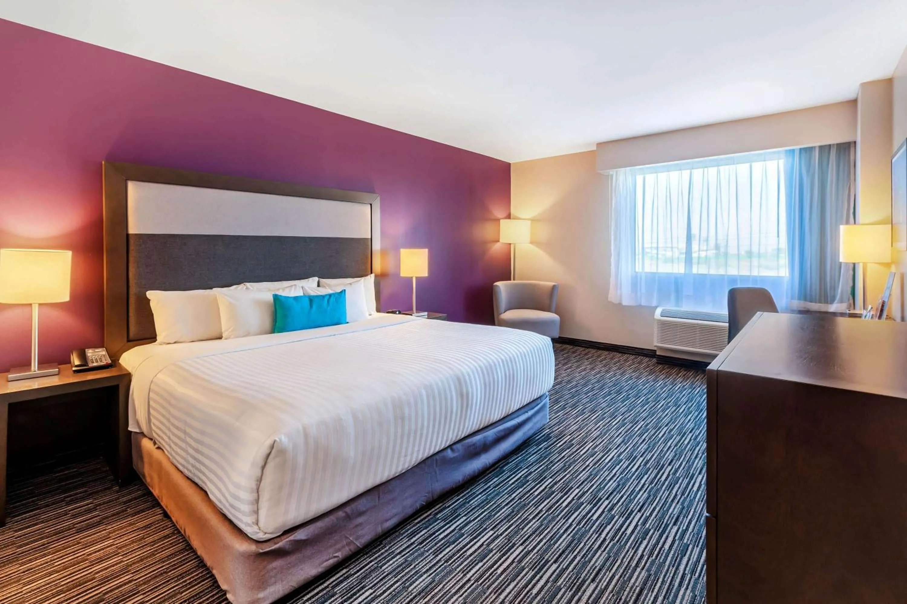 Photo of the whole room, Bed in CHN Hotel Monterrey Aeropuerto, Trademark by Wyndham