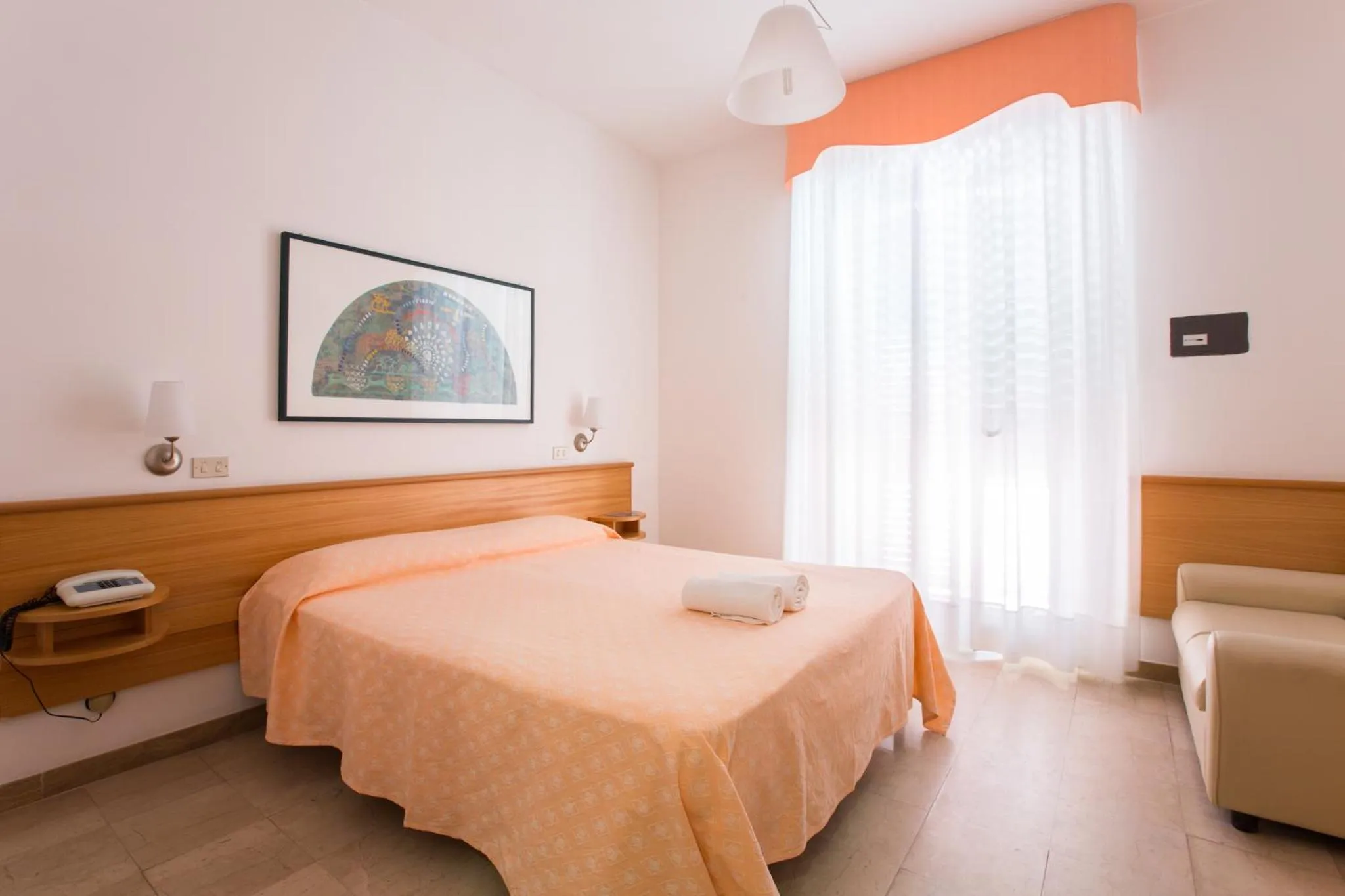 Bed in Hotel Mediterraneo