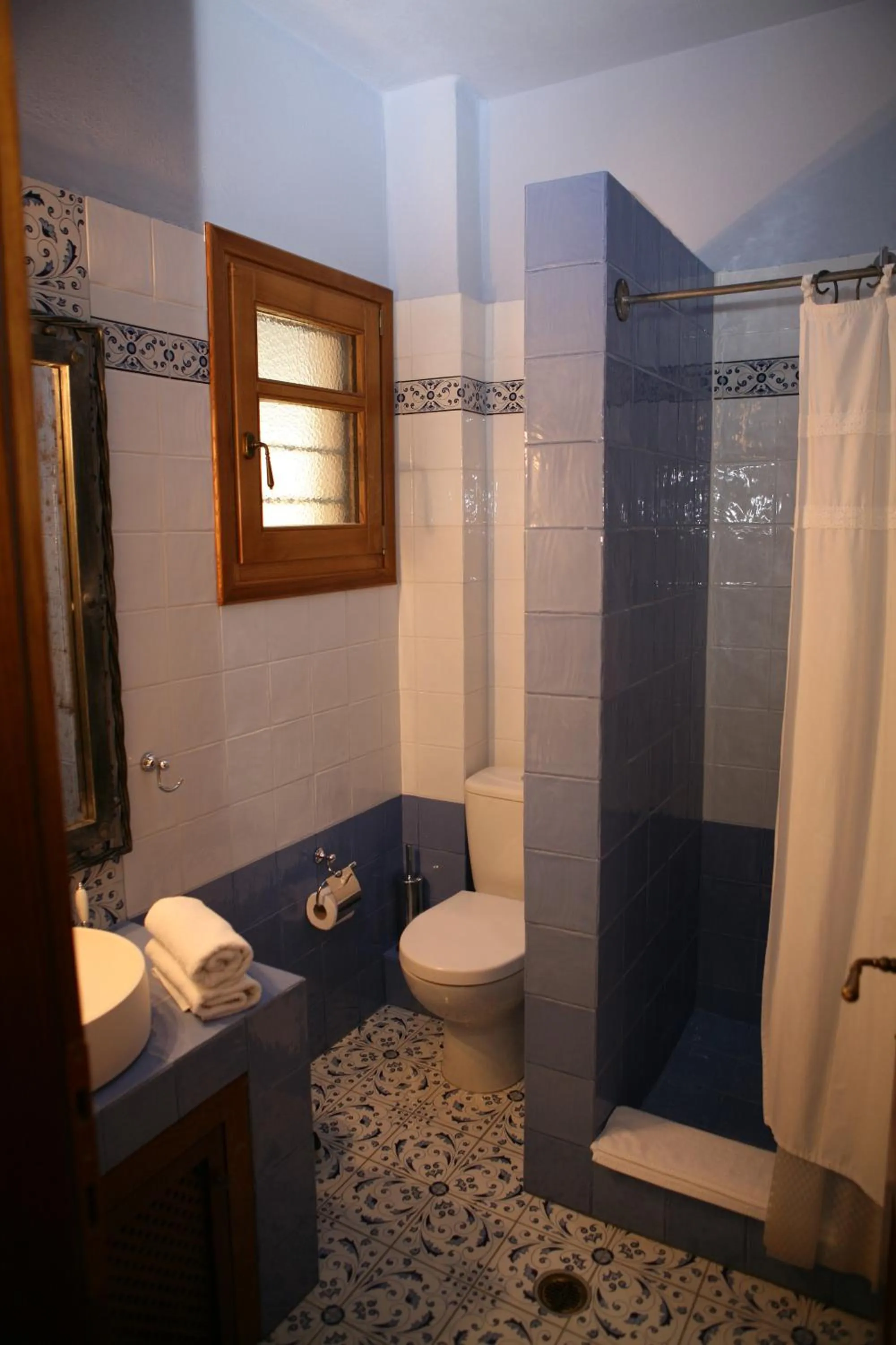 Bathroom in Roes Suites